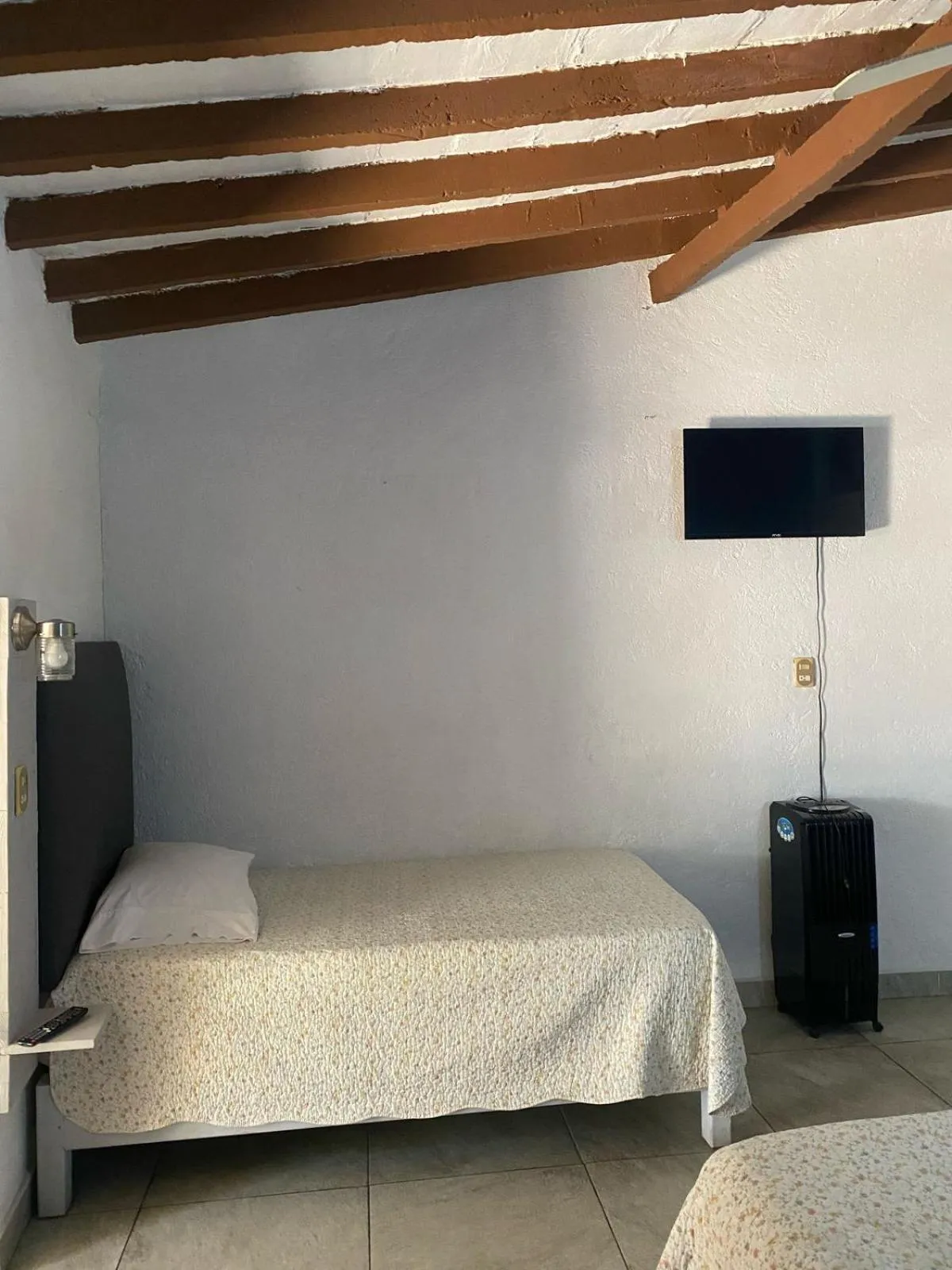 Bed in Posada Casa Topiltzin