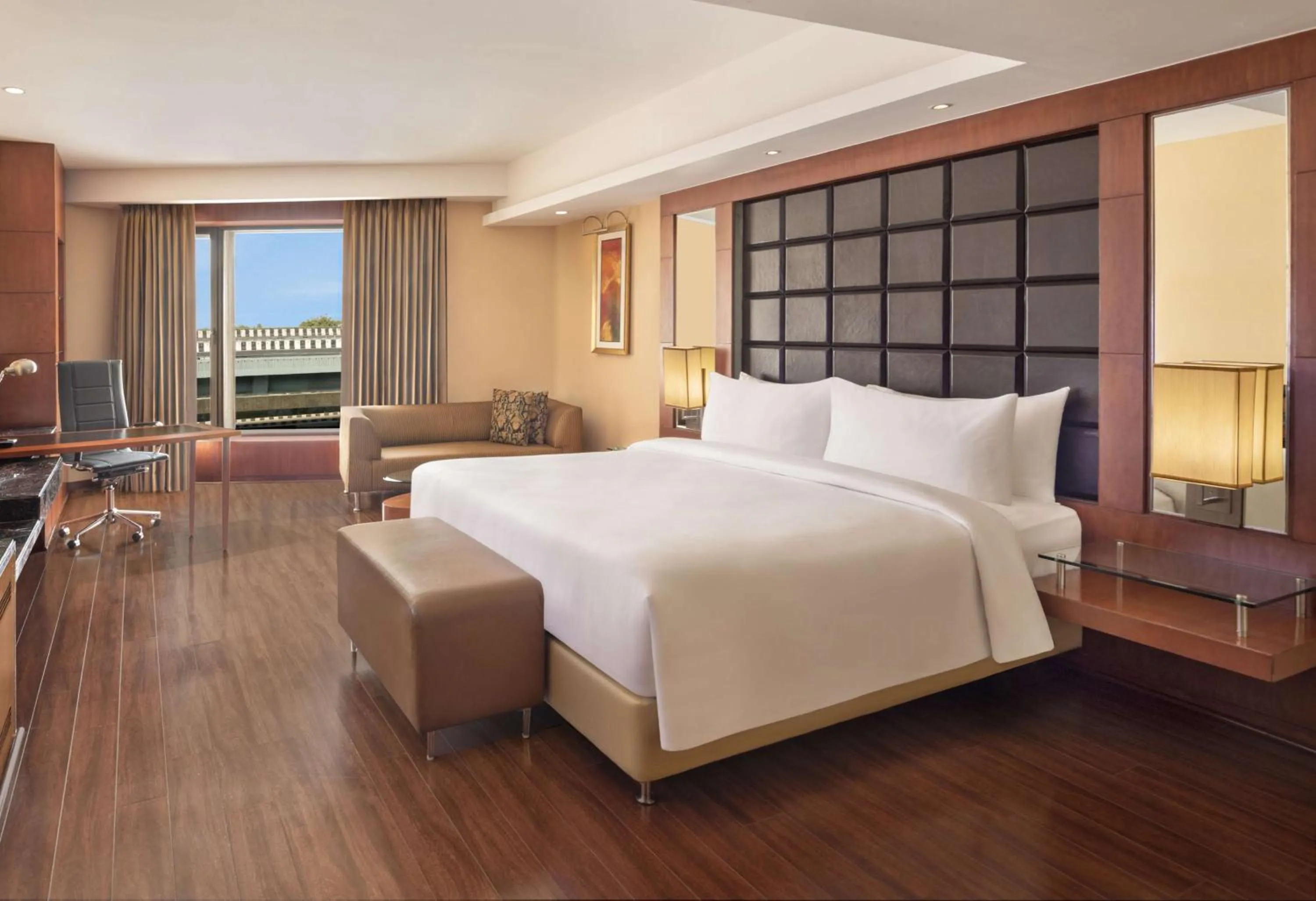 Photo of the whole room, Bed in Radisson Blu Plaza Delhi Airport