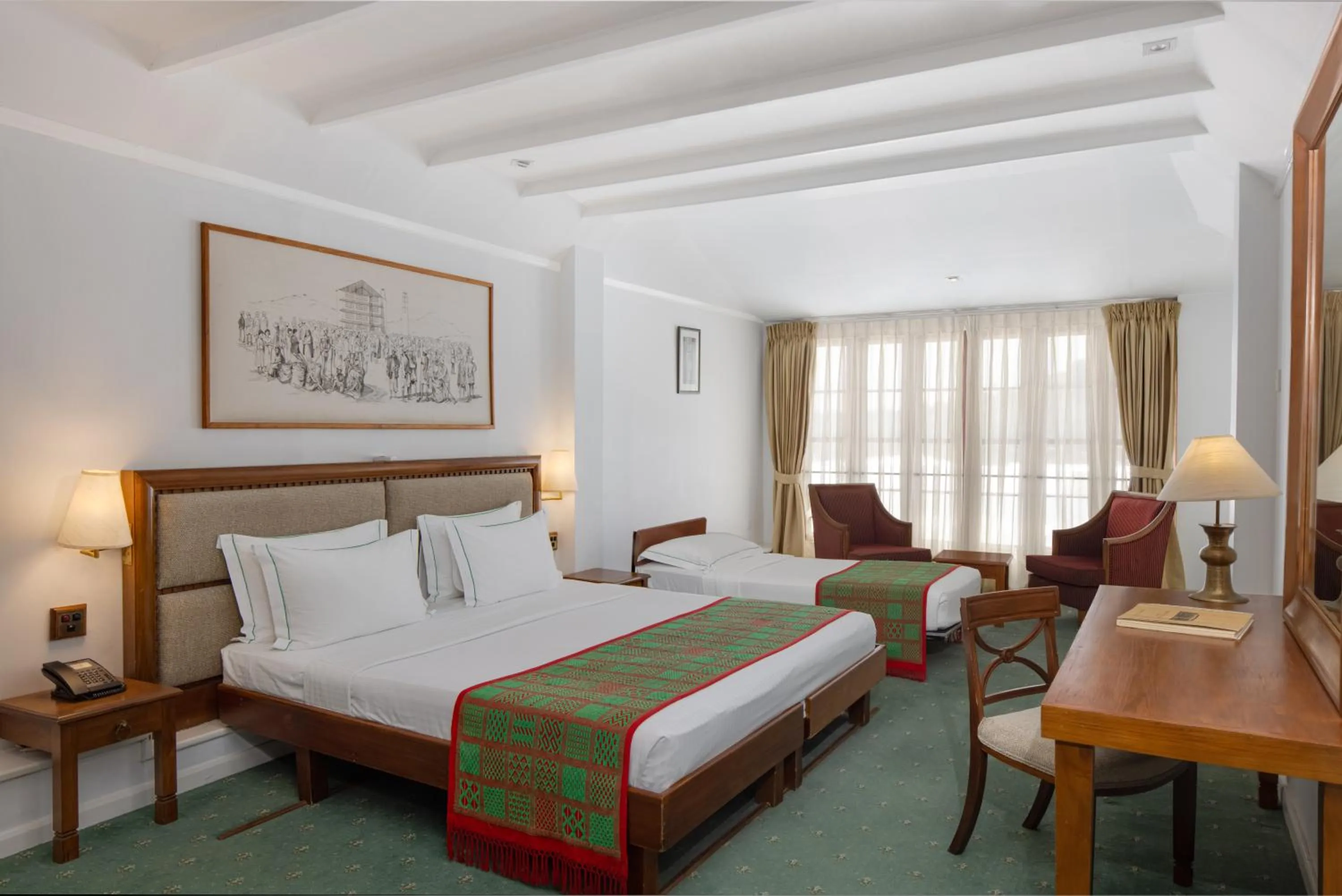 Photo of the whole room, Bed in Heritance Tea Factory