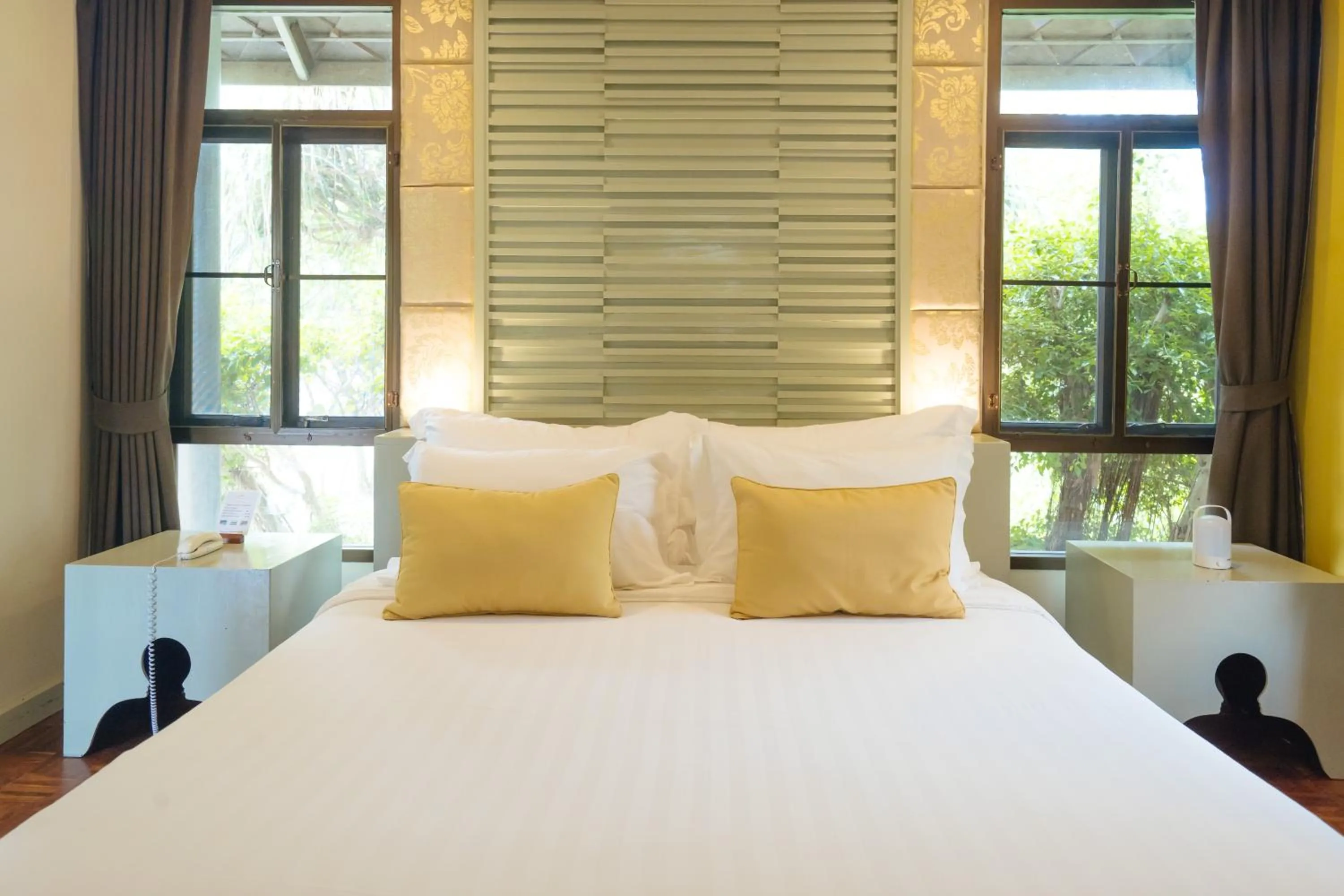 Bed in Sirarun Resort