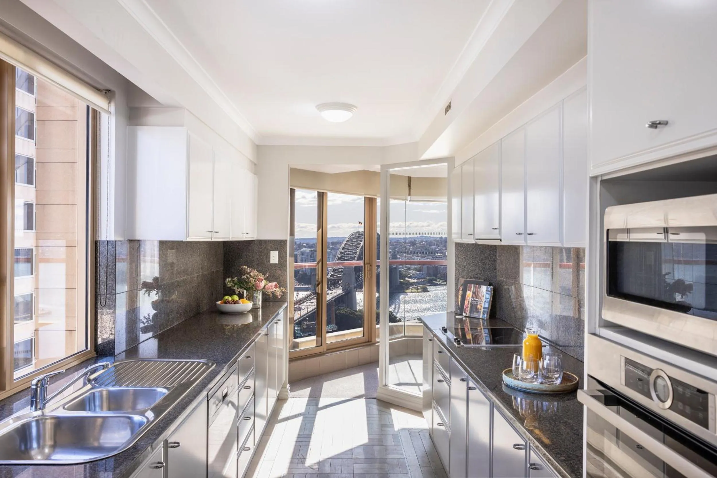 Kitchen or kitchenette in The Sebel Quay West Suites Sydney