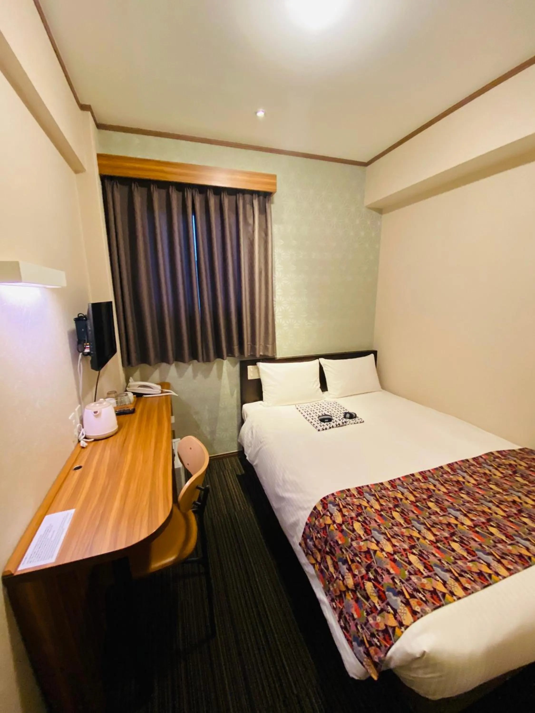 Bed in Ueno Touganeya Hotel