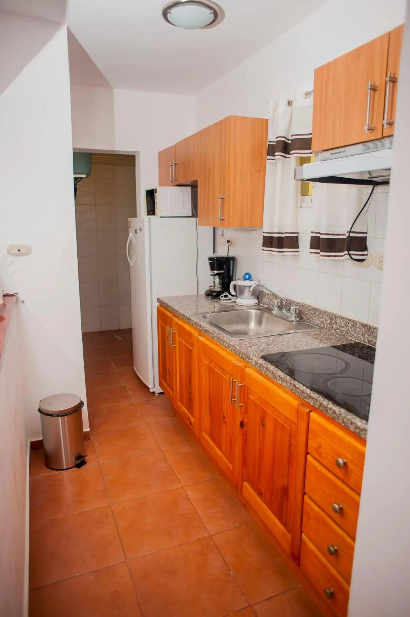 Kitchen or kitchenette in Cocotal Bavaro Apartments