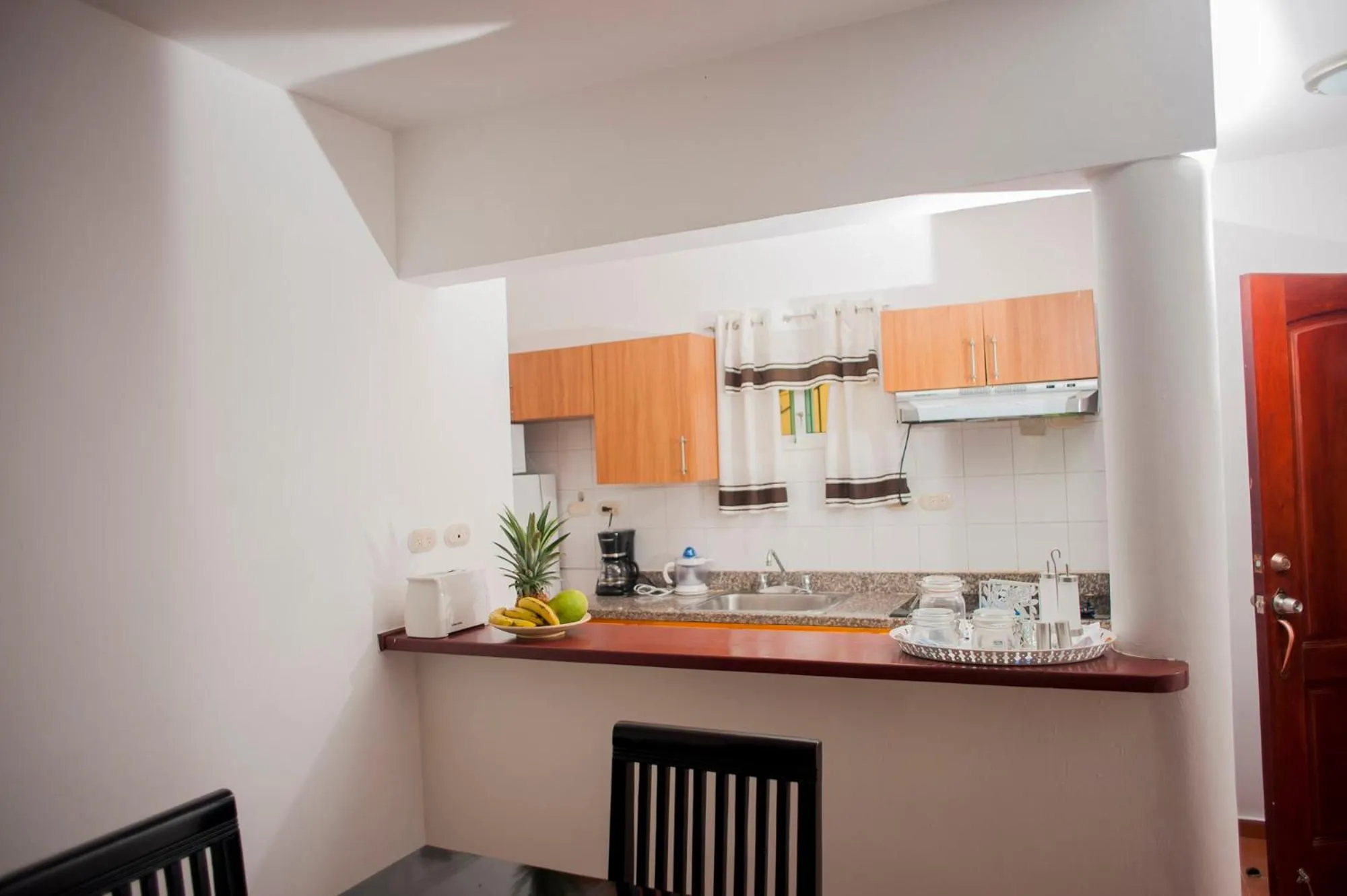 Kitchen or kitchenette in Cocotal Bavaro Apartments