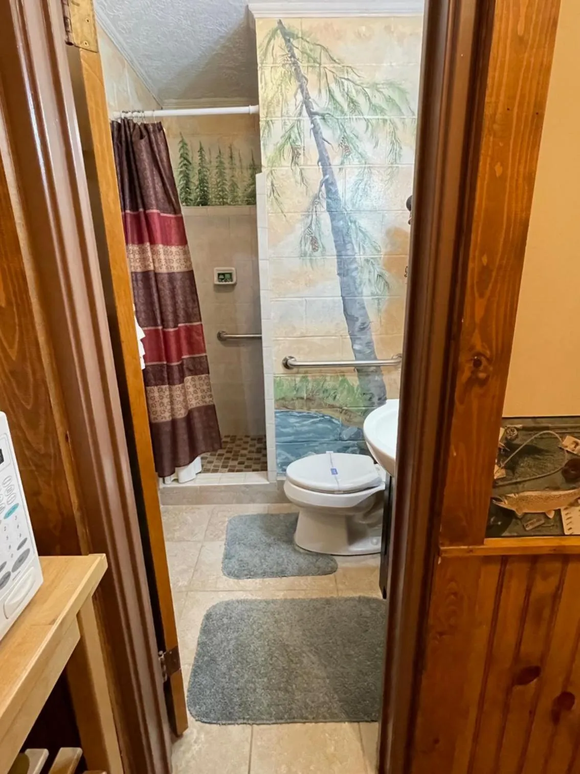 Shower in Mountain Aire Cottages, Inn, & Glamping