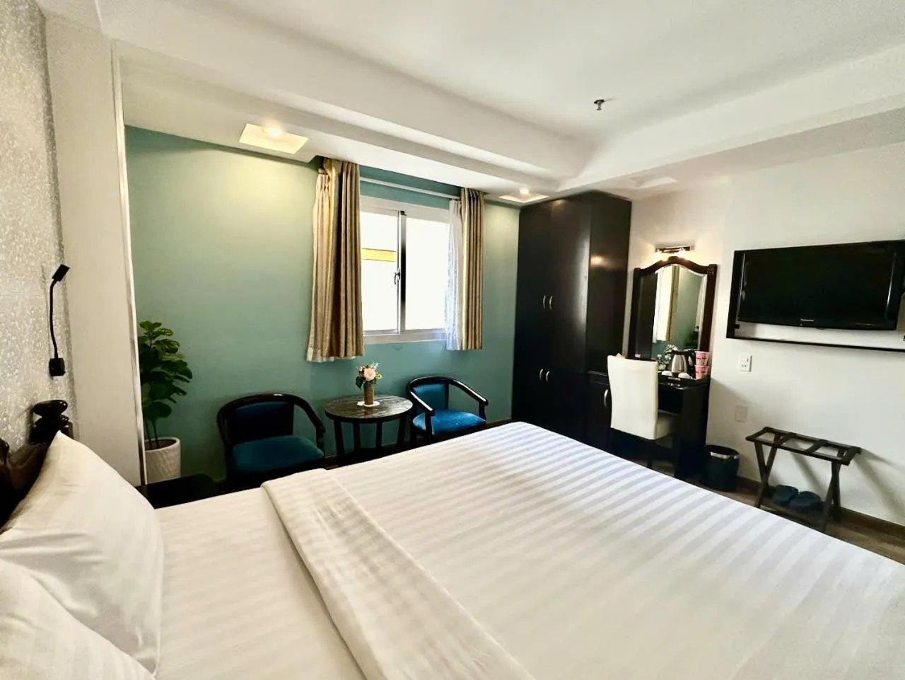 Bed in Sunrise Central Hotel