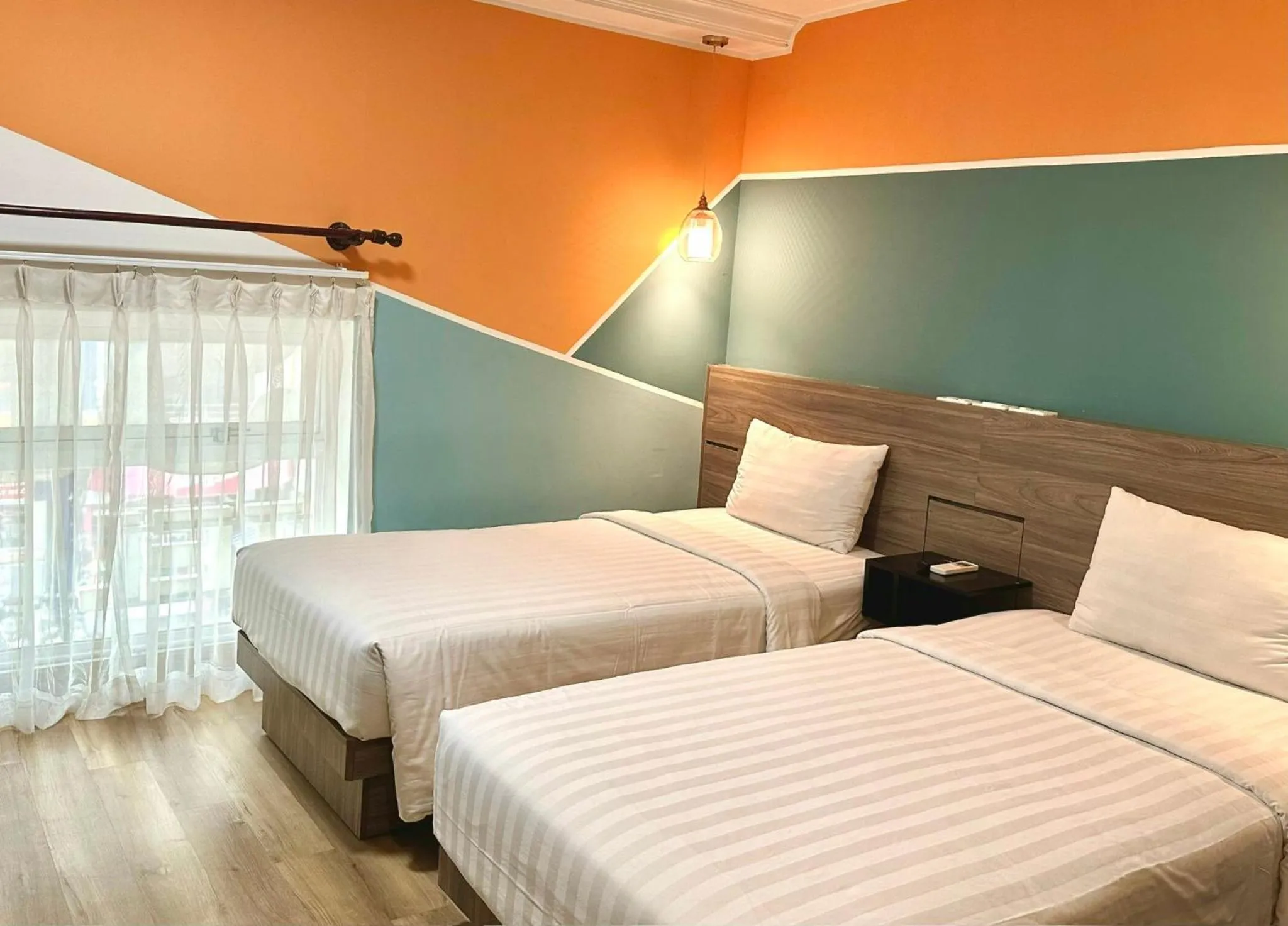 Bed in Sunrise Central Hotel