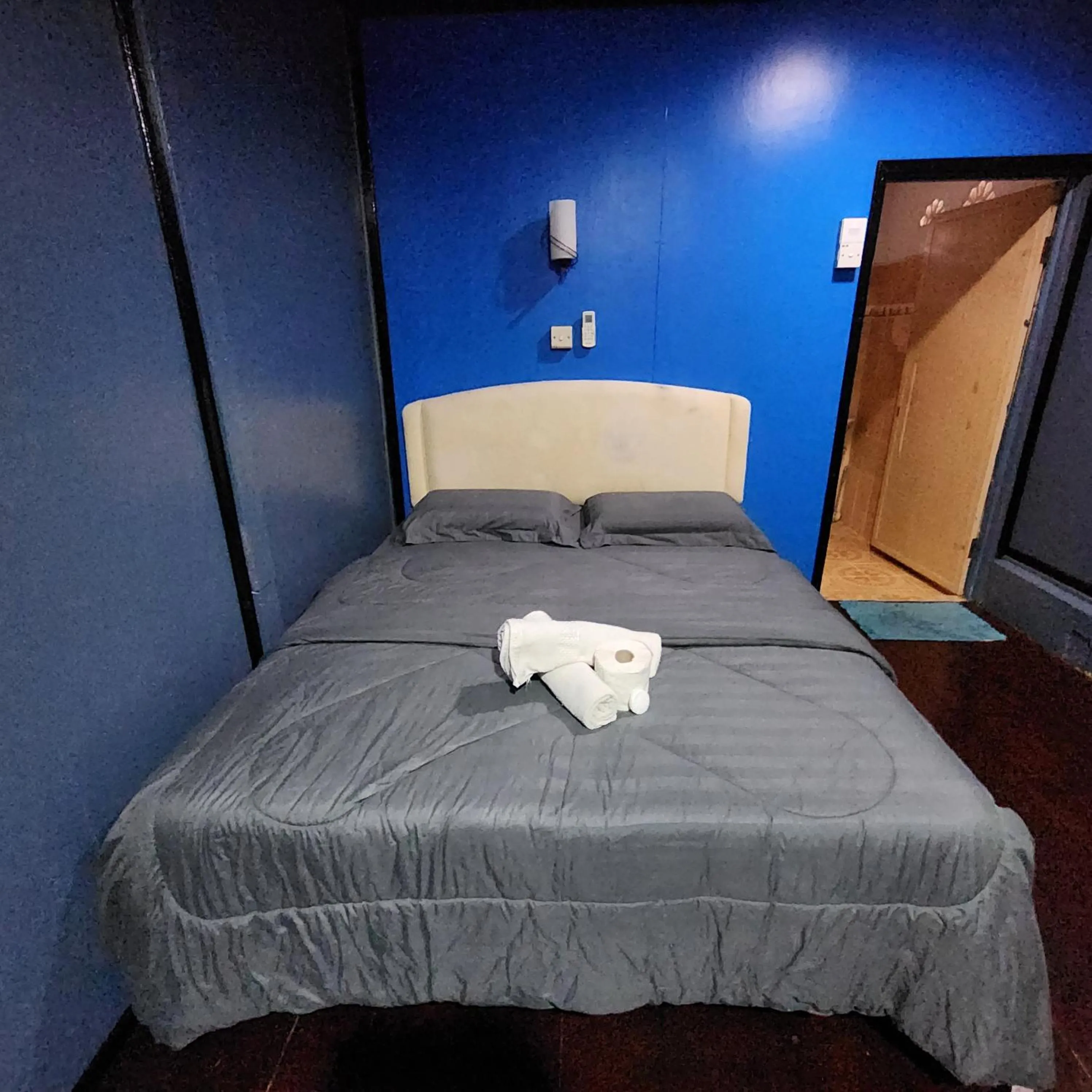 Bed in Permai Chalet Tioman