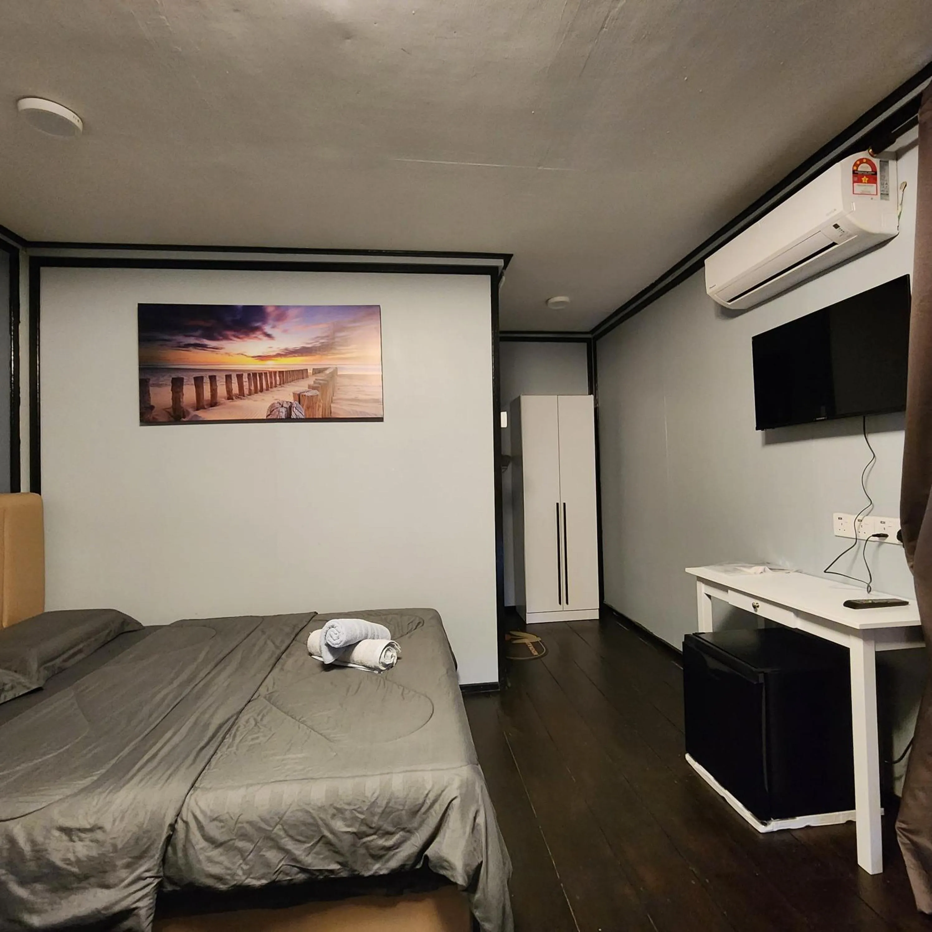 Bed in Permai Chalet Tioman