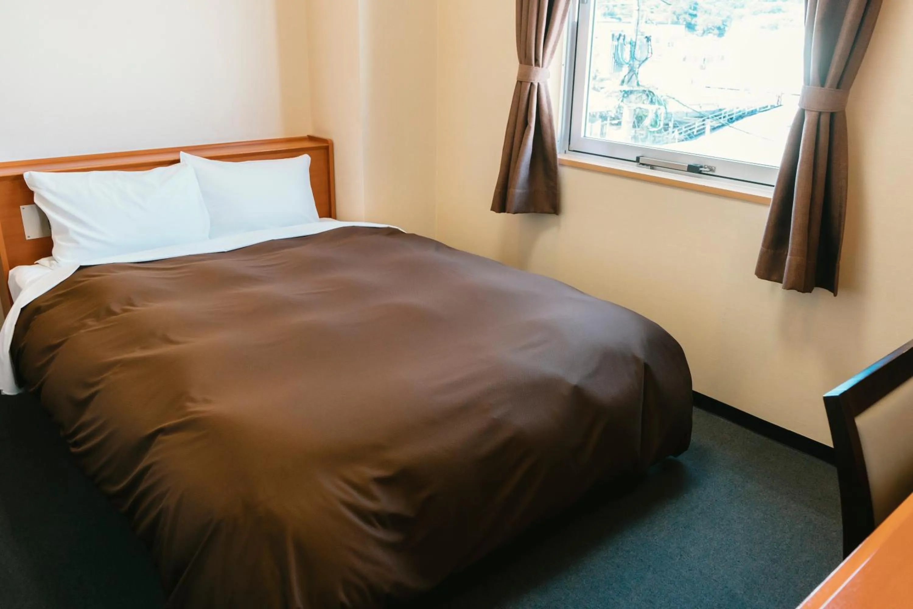 Photo of the whole room, Bed in Kumamoto Ichibamae Business Kurenai Hotel