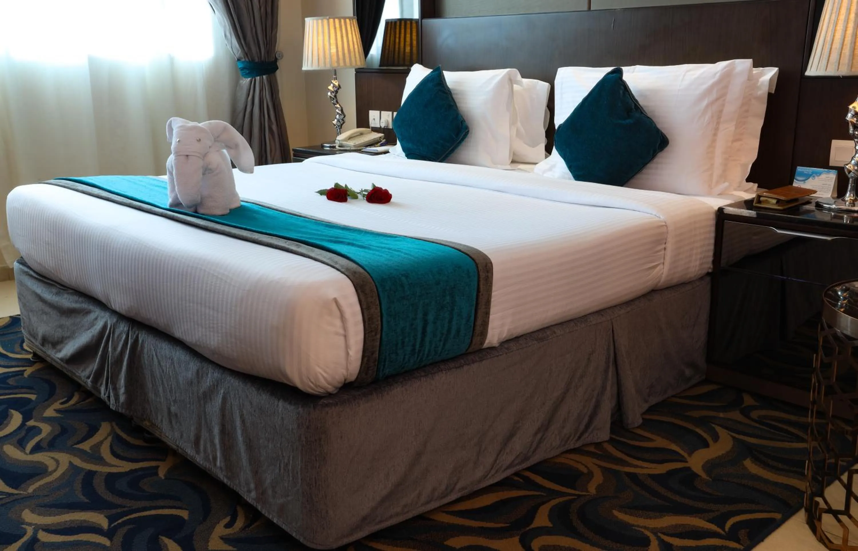 Bed in Omega Hotel Dubai