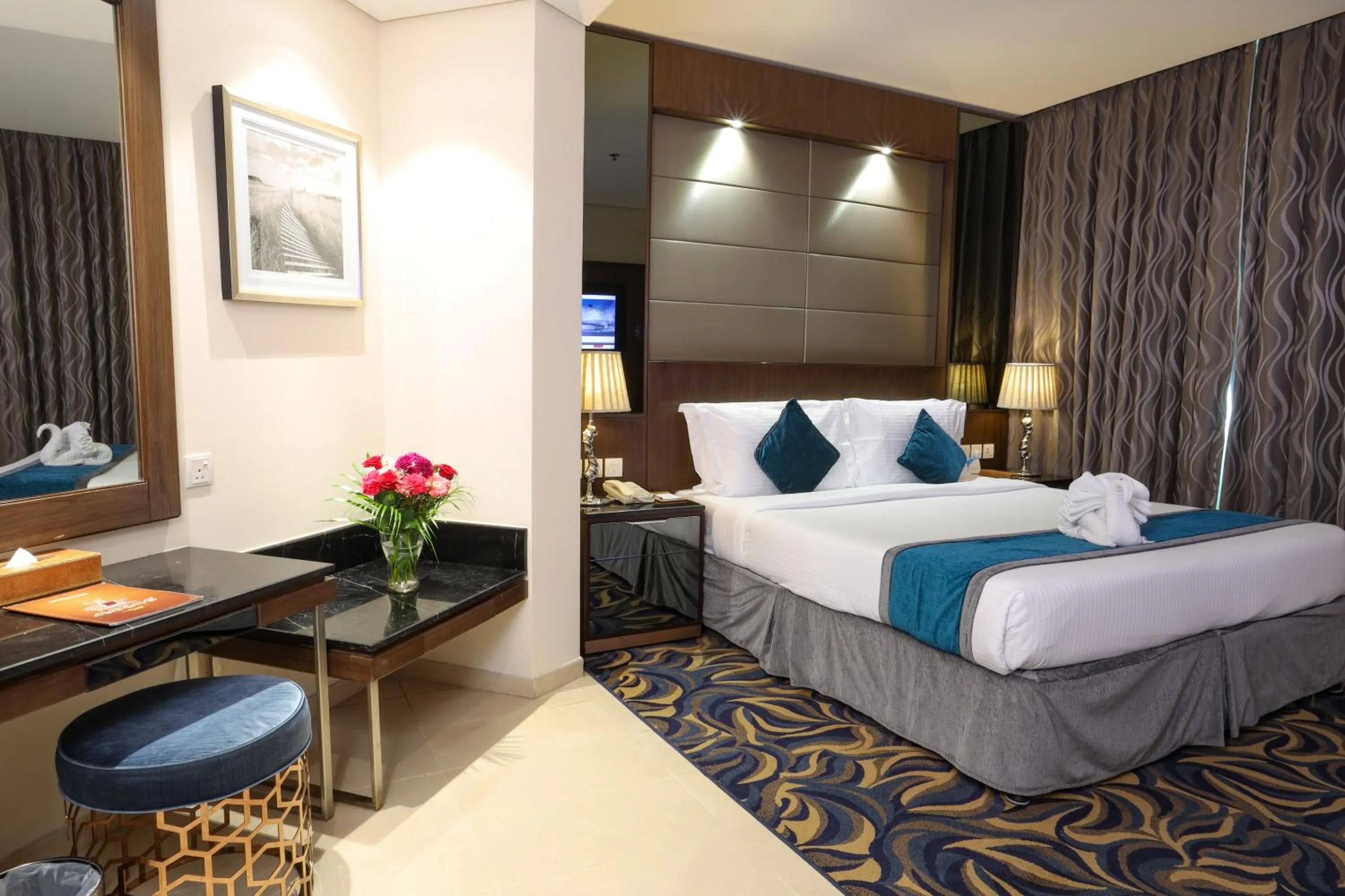 Bed in Omega Hotel Dubai