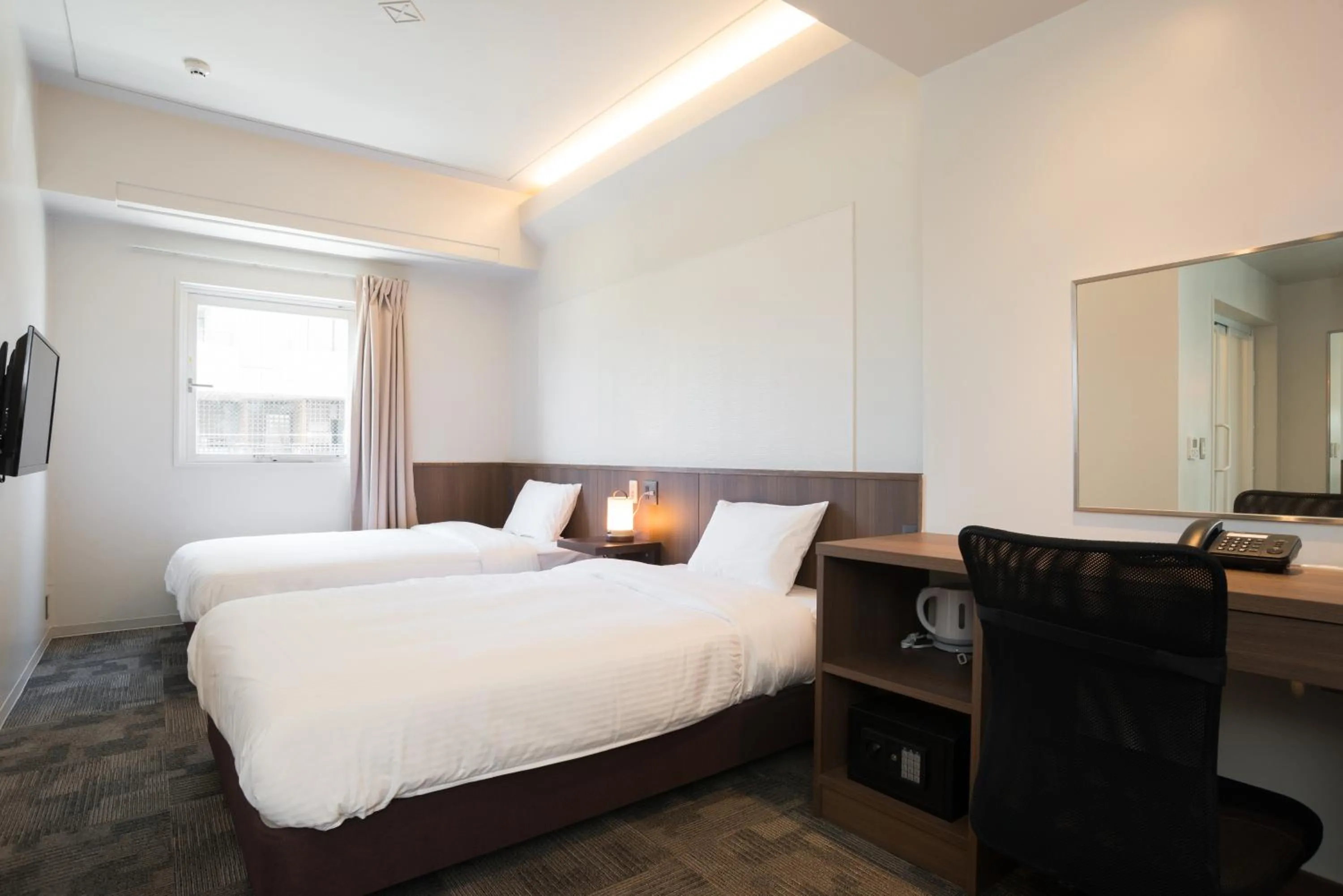 Photo of the whole room, Bed in RJ Hotel Naha