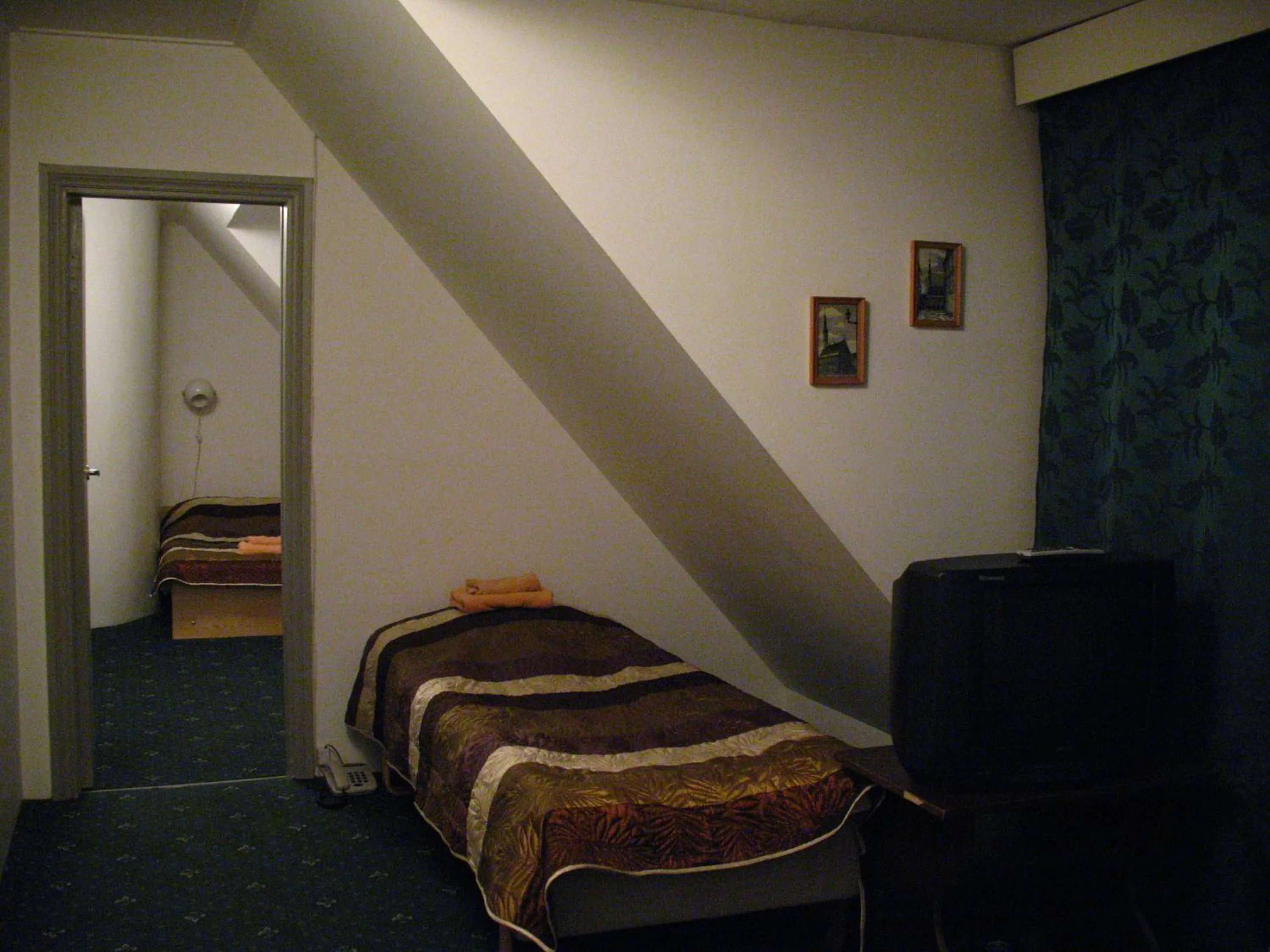 Photo of the whole room, Bed in Nepi Hotell