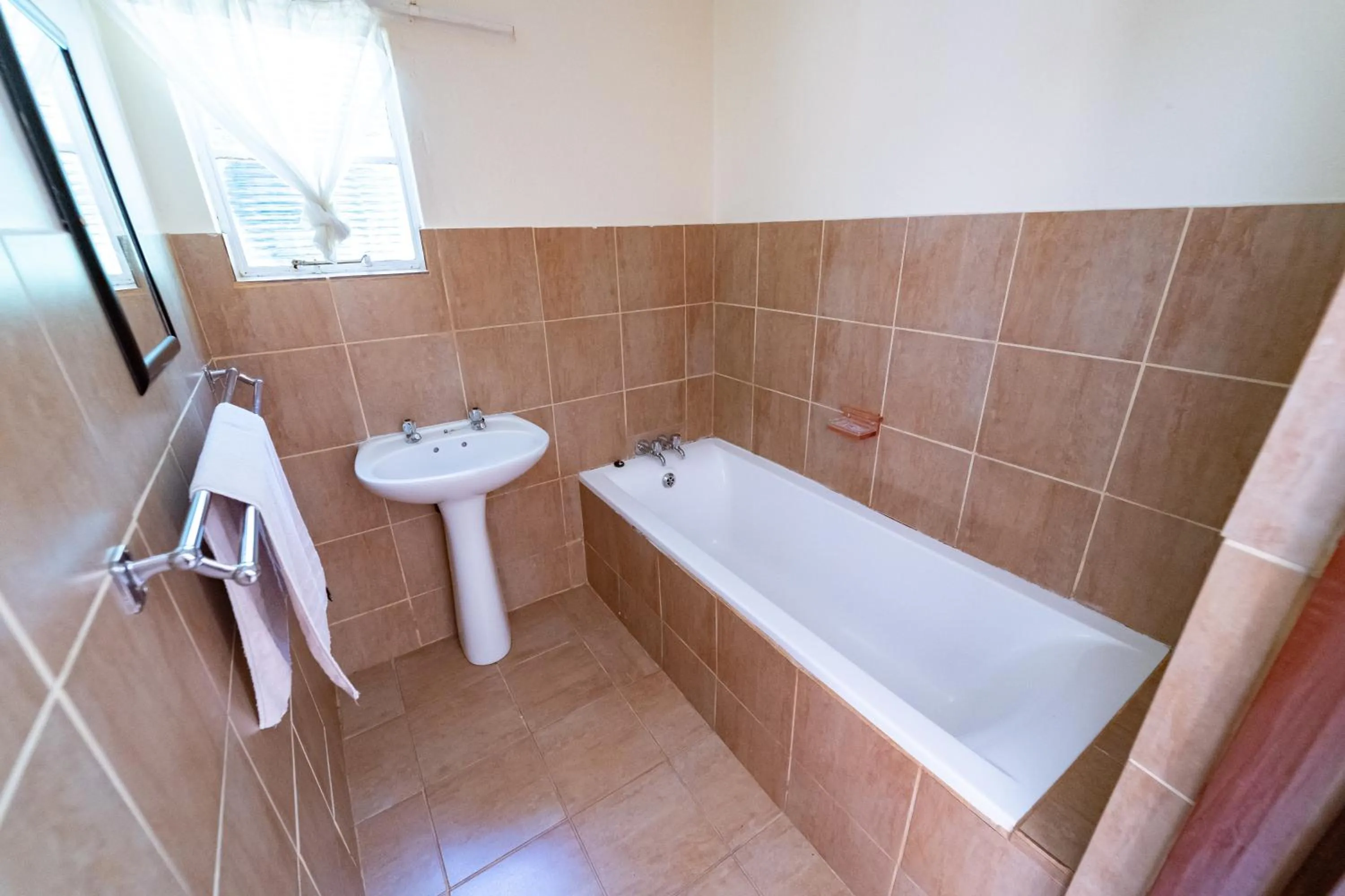 Bathroom in Gooderson Drakensberg Gardens Golf & Spa Resort