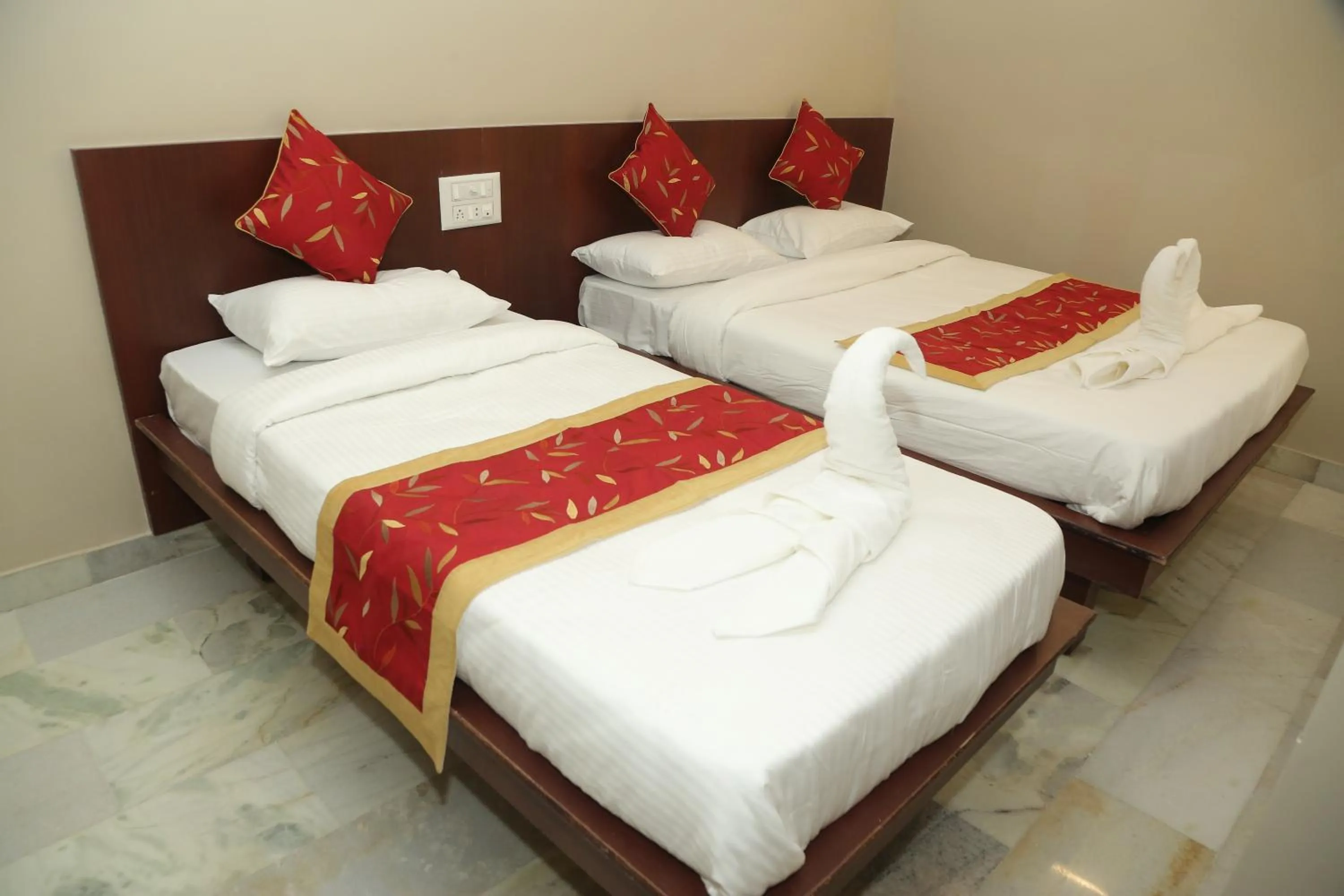 Bed in Soundarya Hotel