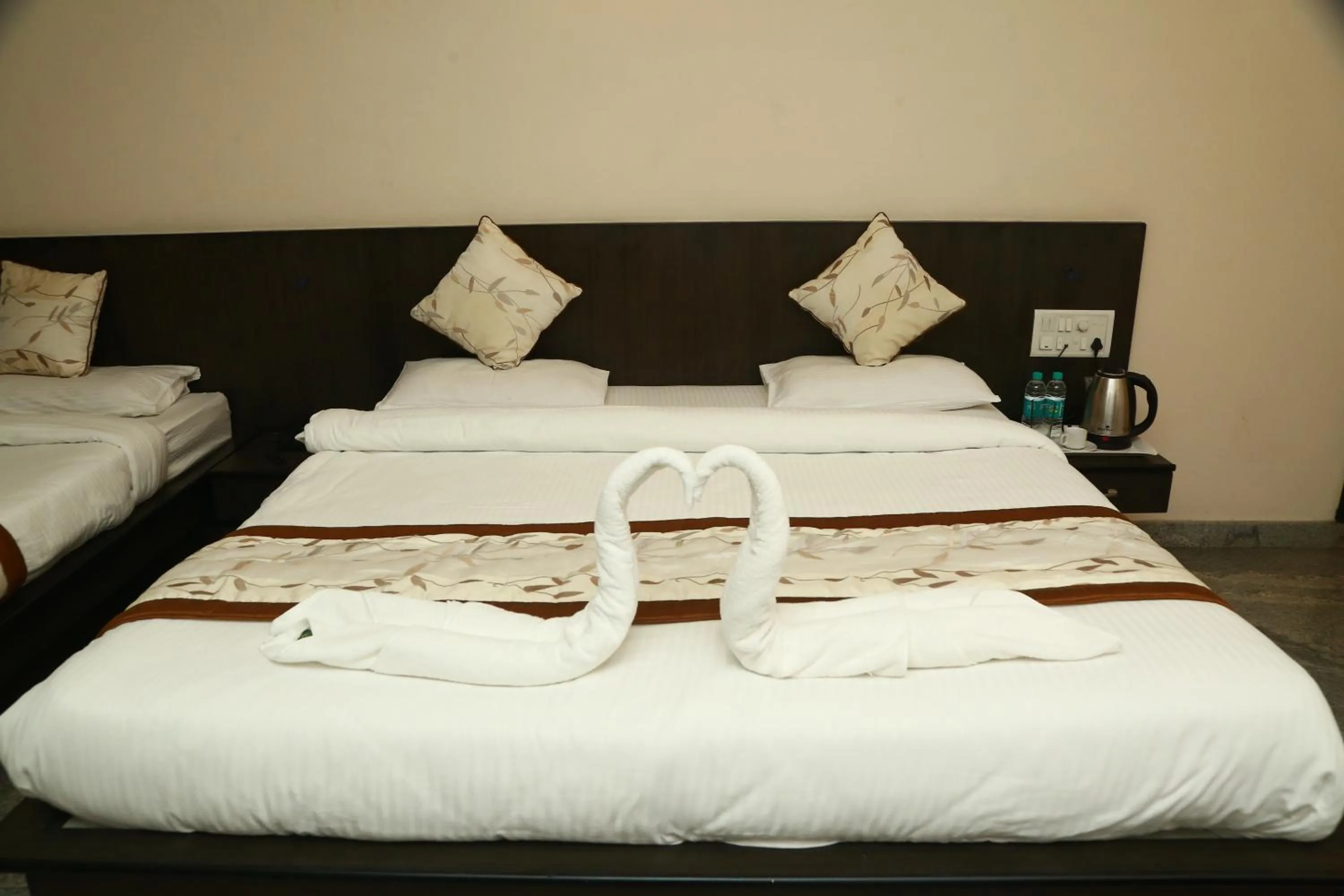 Bed in Soundarya Hotel