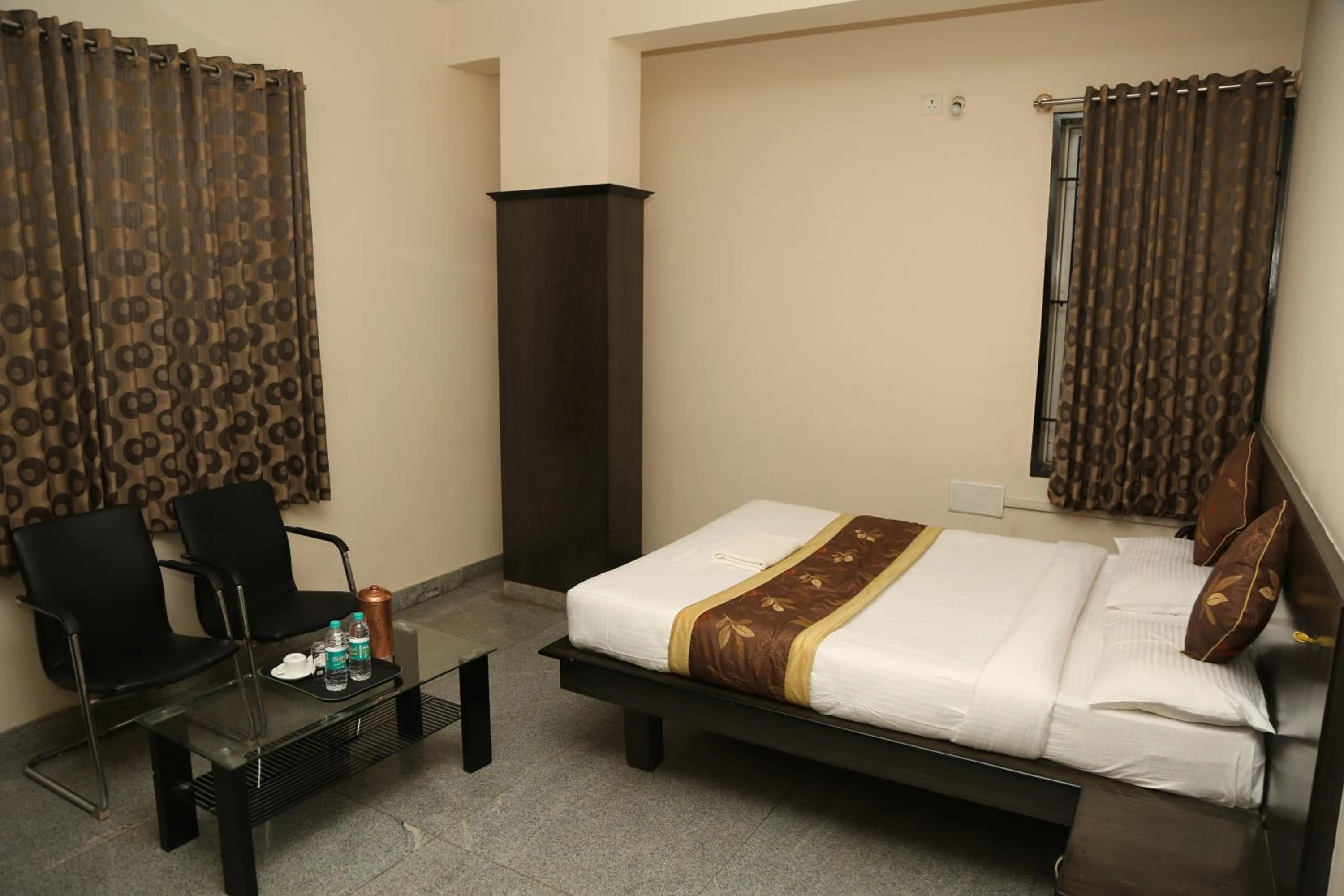 Bed in Soundarya Hotel
