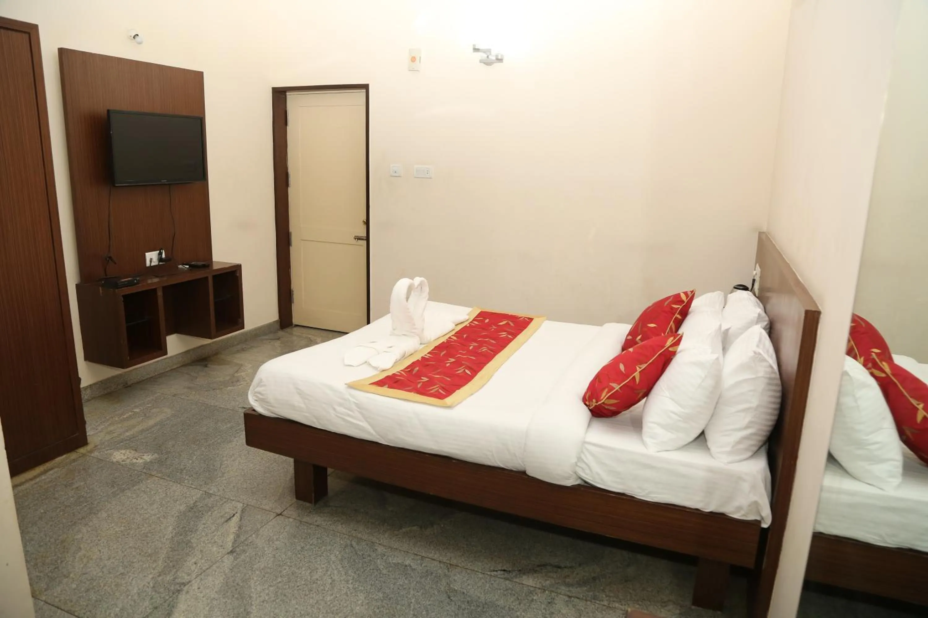 Bed in Soundarya Hotel