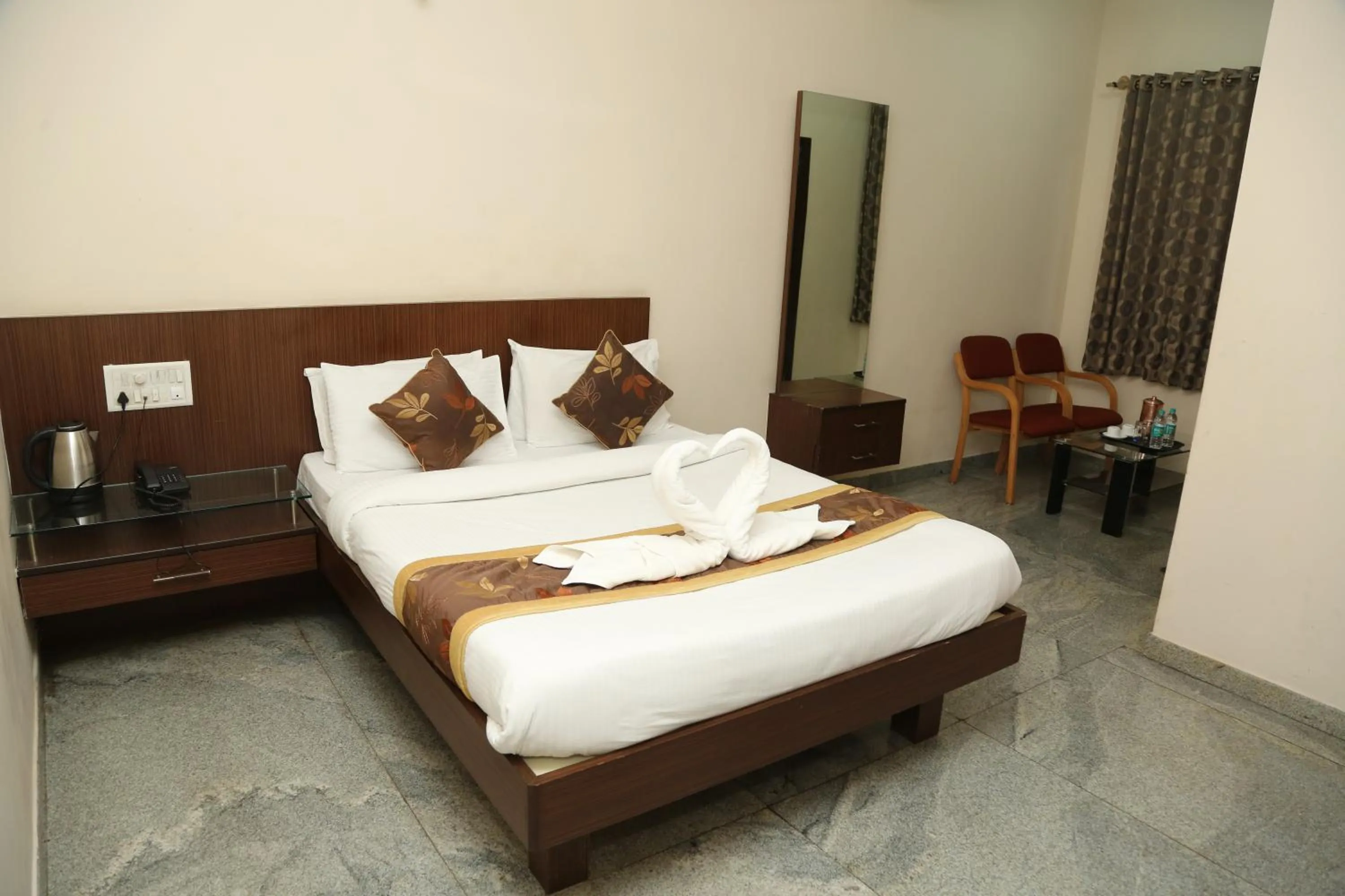 Bed in Soundarya Hotel