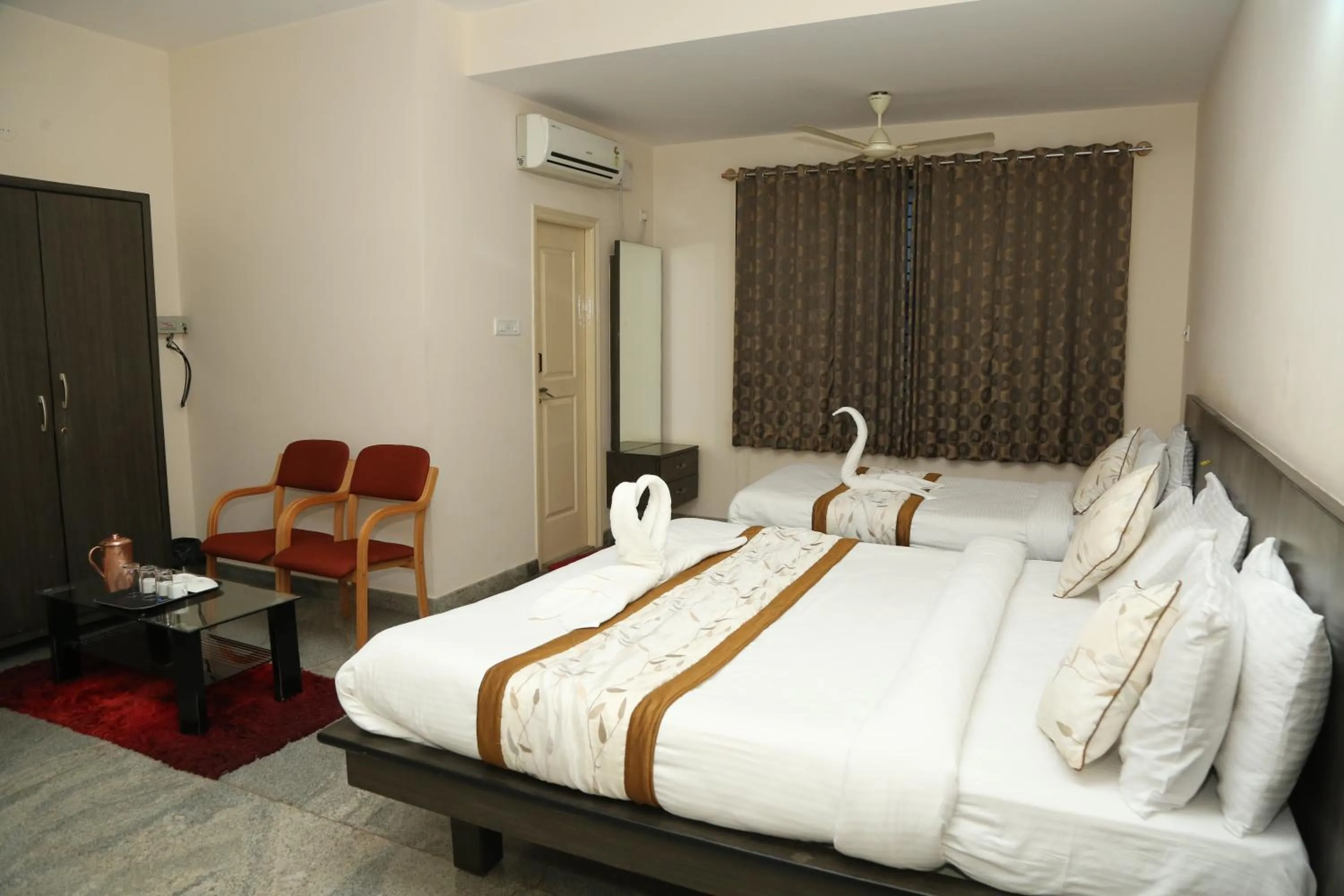Bed in Soundarya Hotel