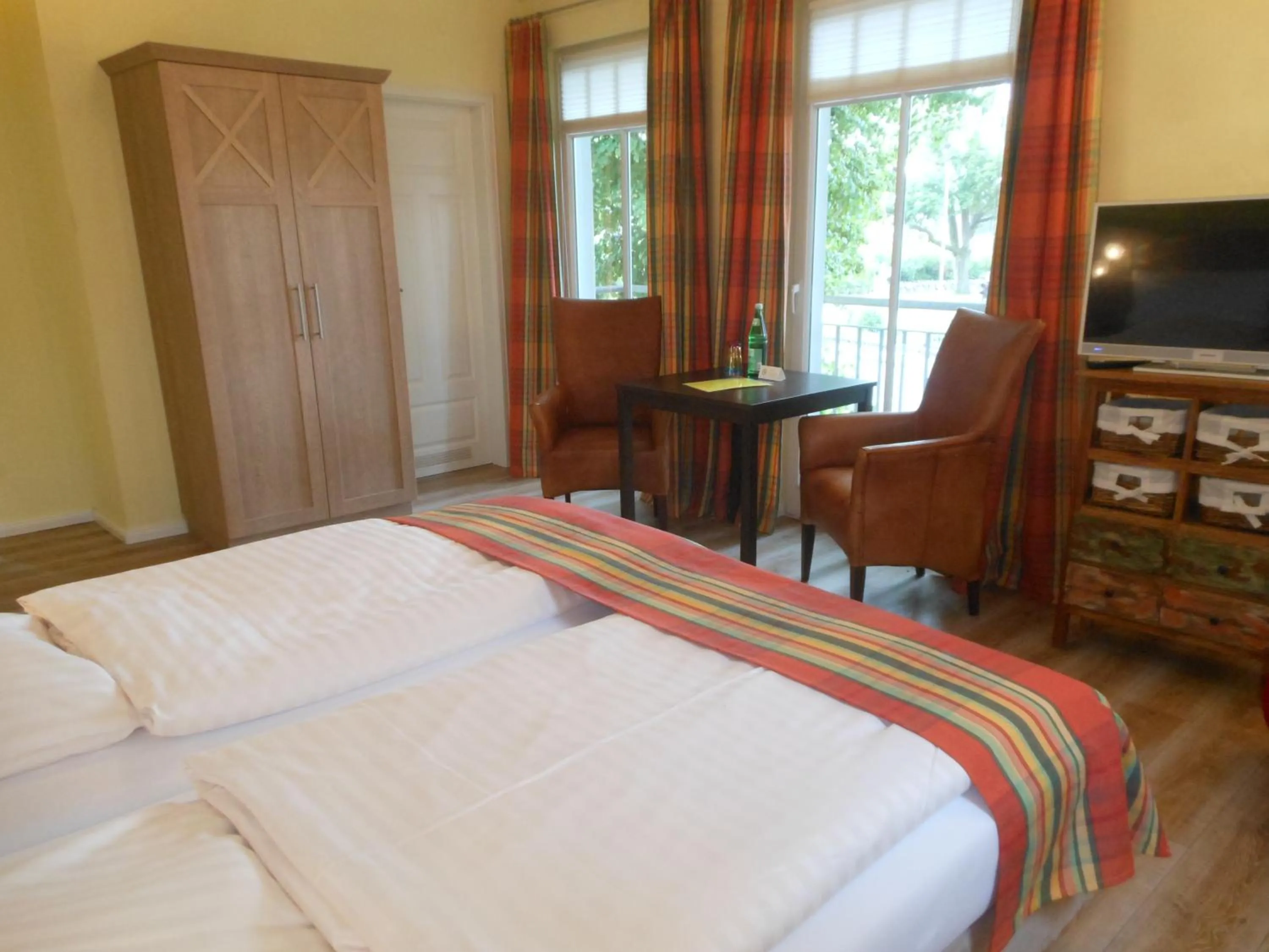 Photo of the whole room, Bed in Landhaus Hammoor Stieper Gastronomie GmbH