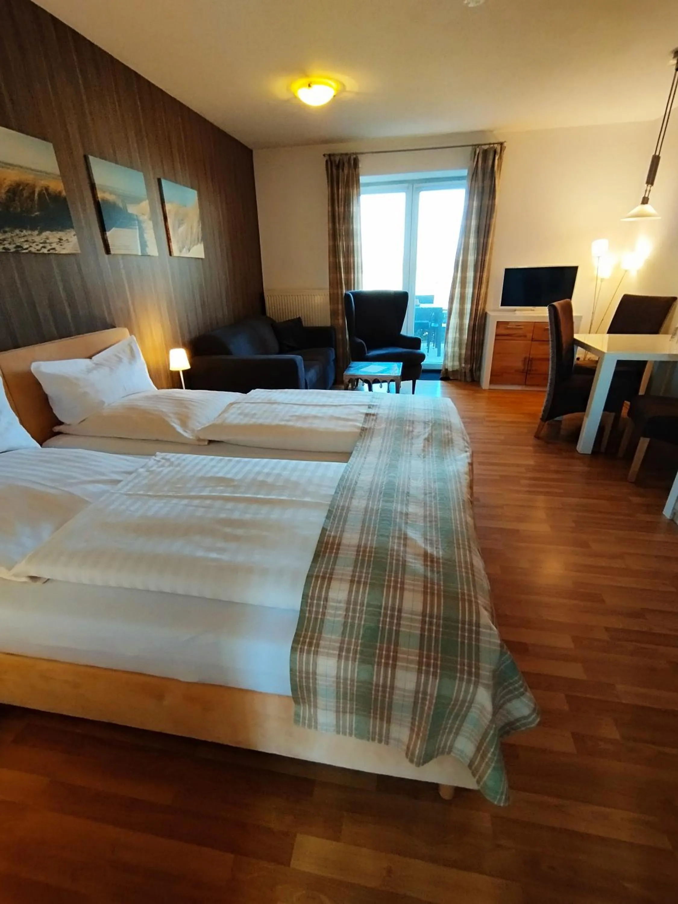 Photo of the whole room, Bed in Landhaus Hammoor Stieper Gastronomie GmbH