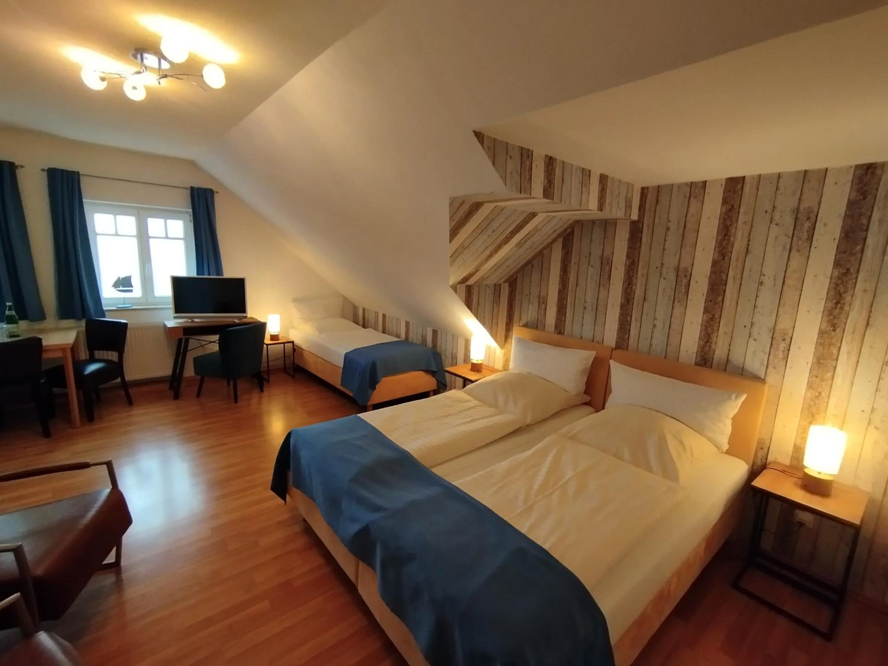 Photo of the whole room, Bed in Landhaus Hammoor Stieper Gastronomie GmbH