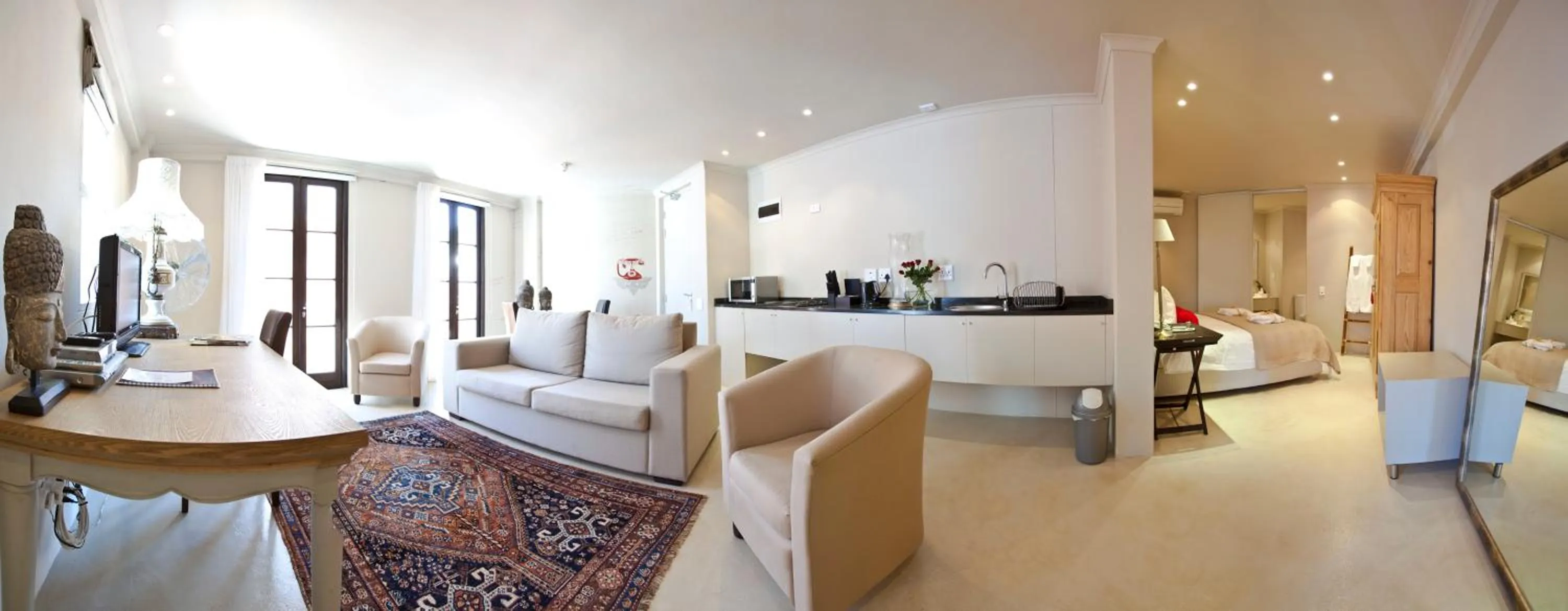 Seating area in Rouge on Rose Boutique Hotel