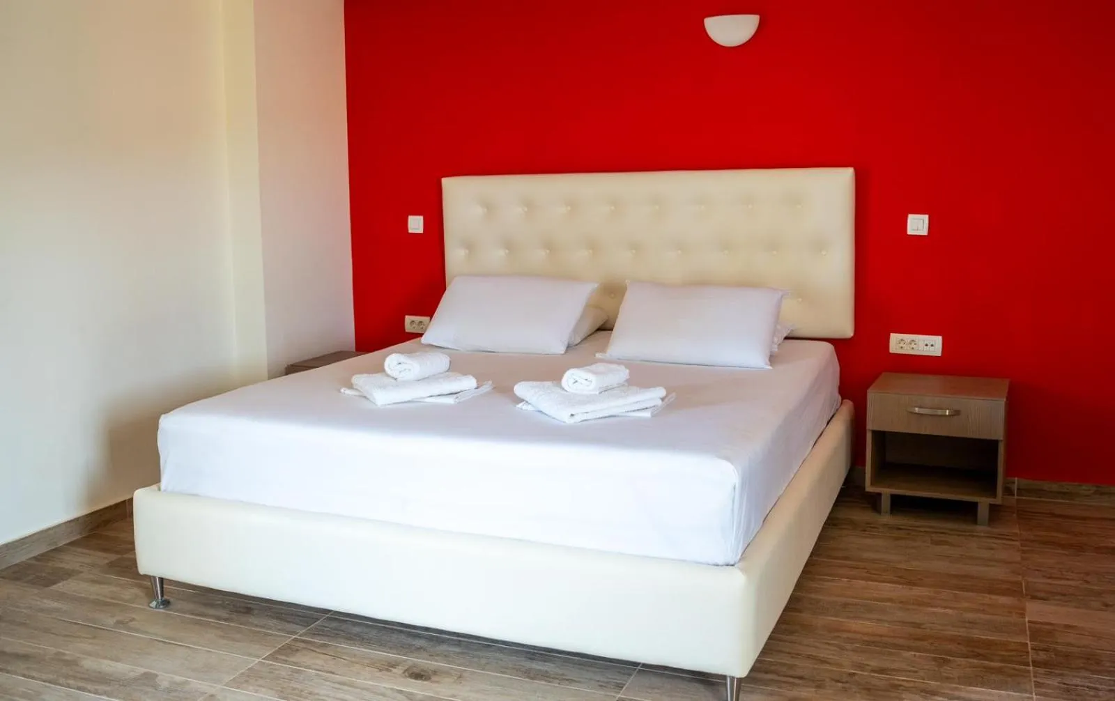 Property building, Bed in Coralli Hotel