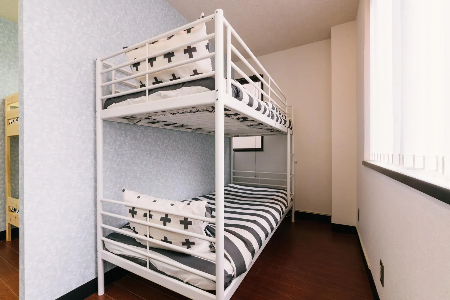 Bed in Guest House Yasuragi Hakataekimae