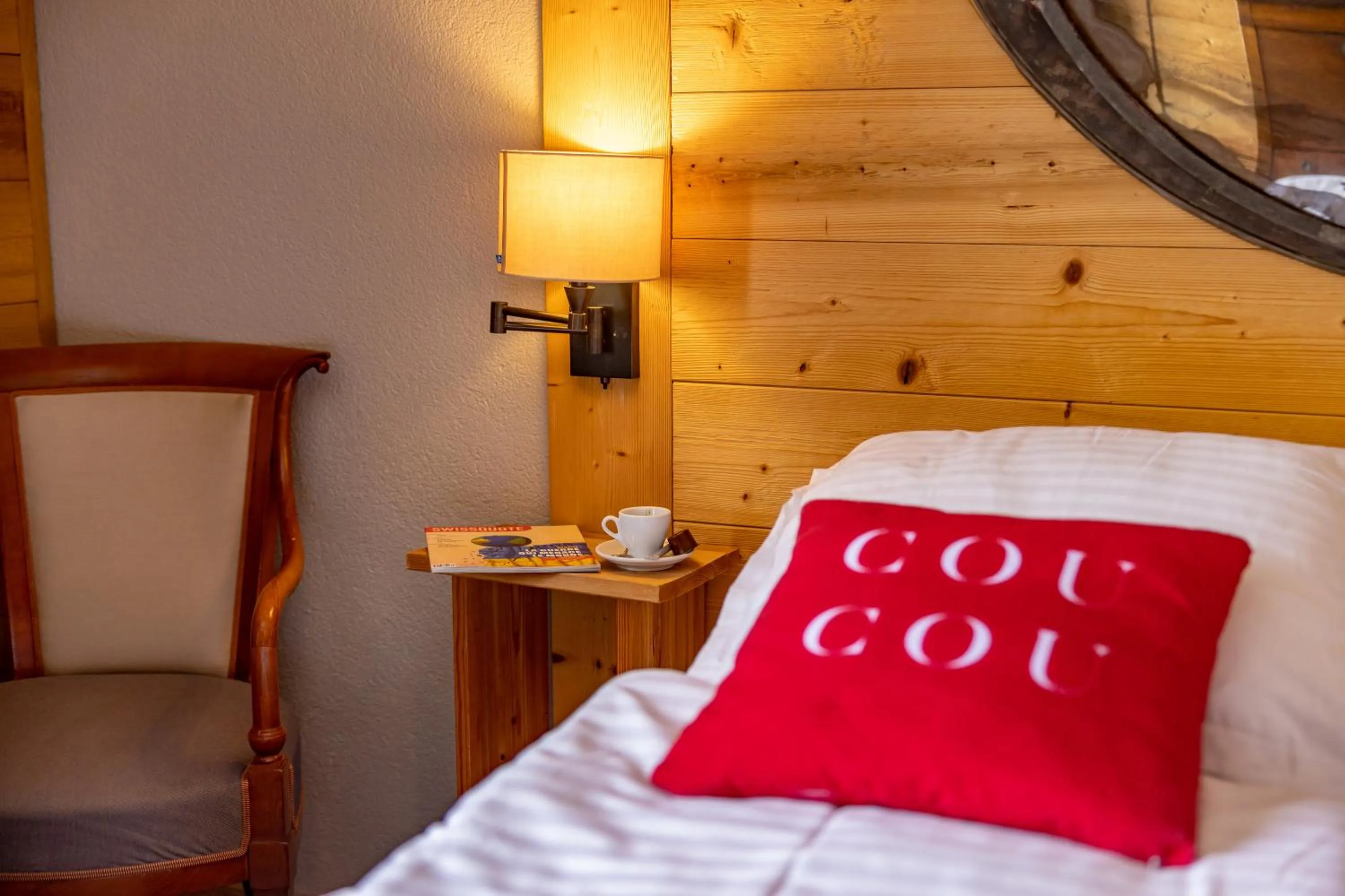 Bed in Le Coucou Hotel Restaurant & Lounge-Bar