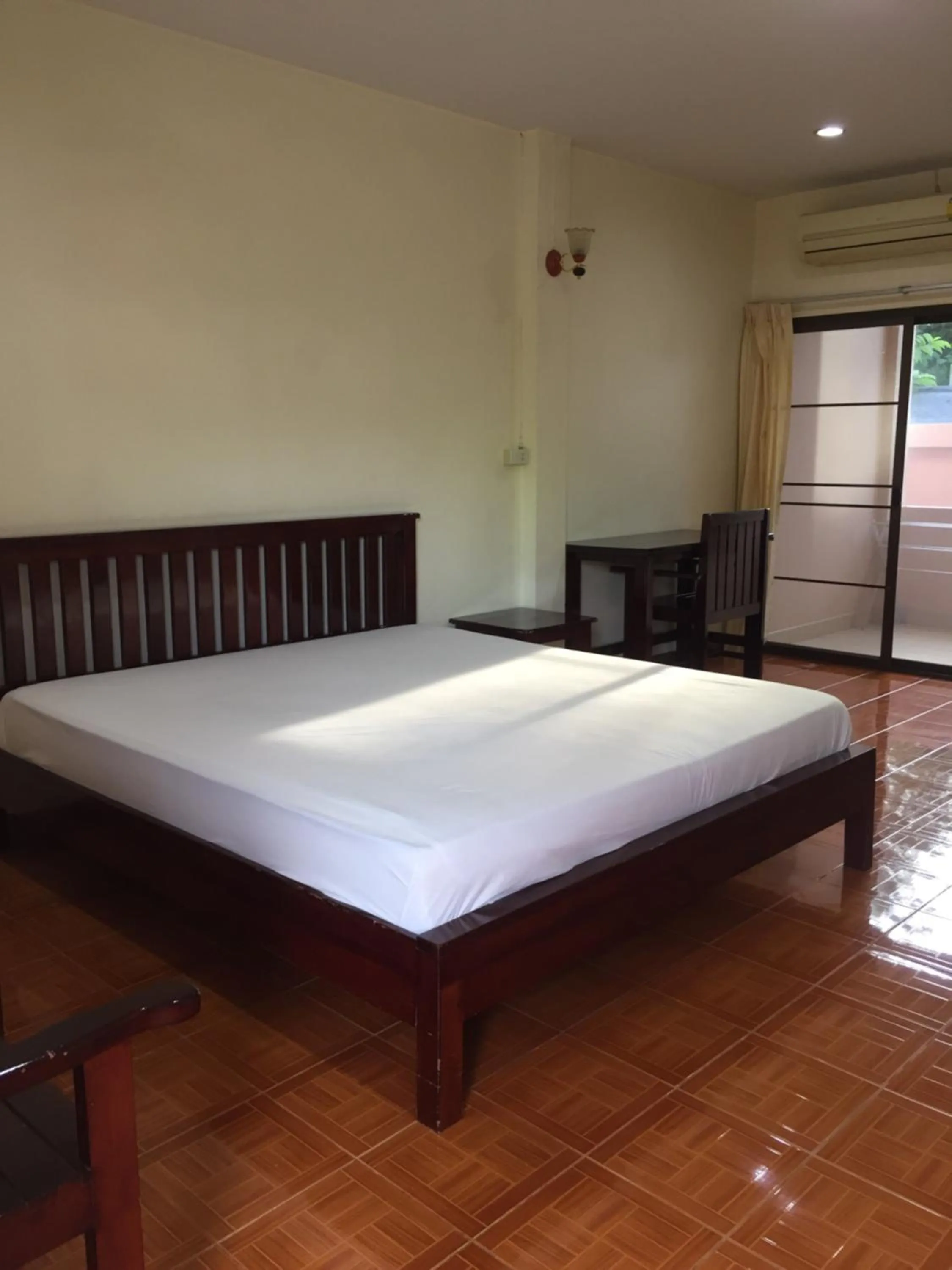 Bed in Poon Suk Hotel Kabin Buri