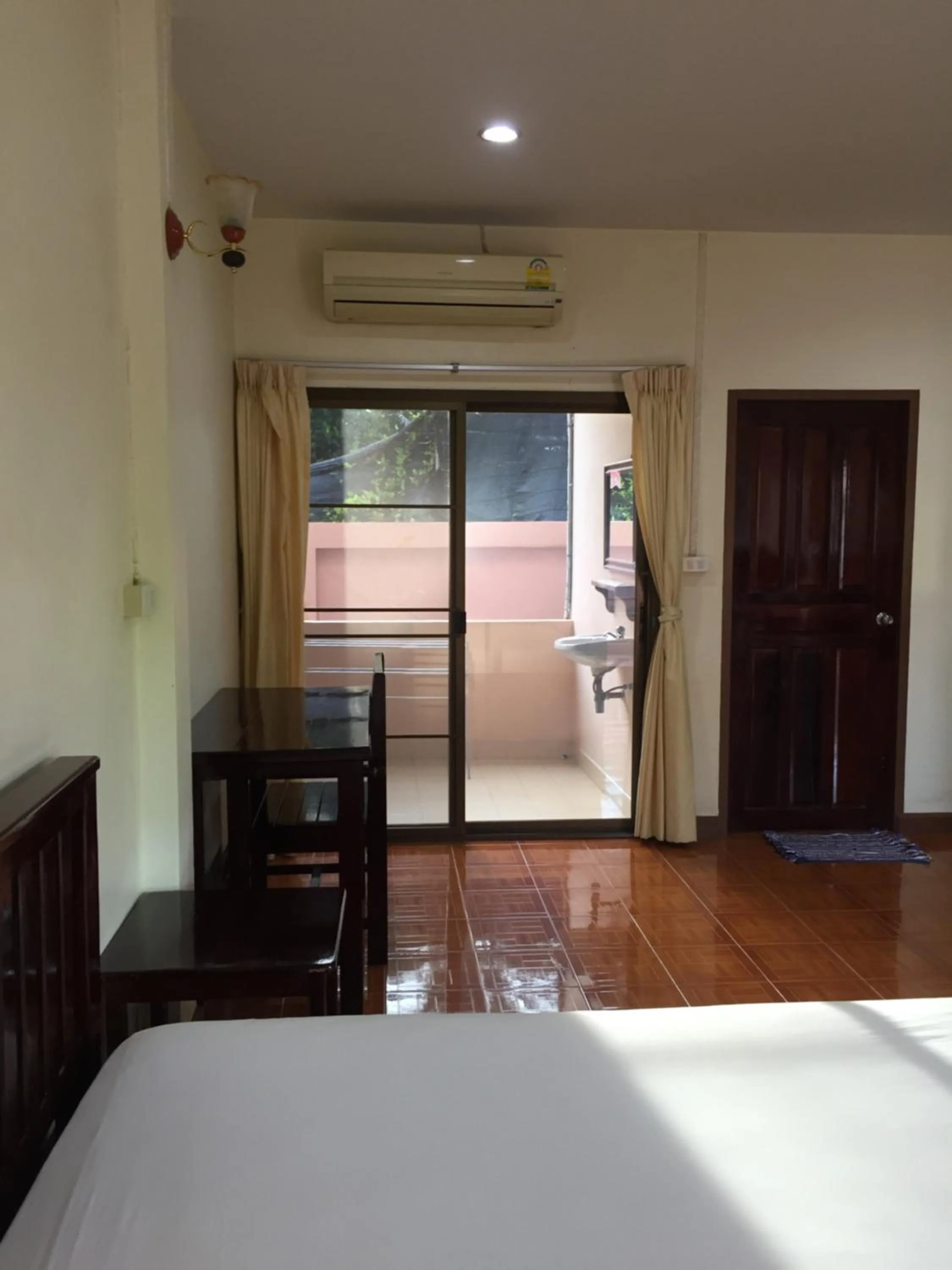 Bed in Poon Suk Hotel Kabin Buri