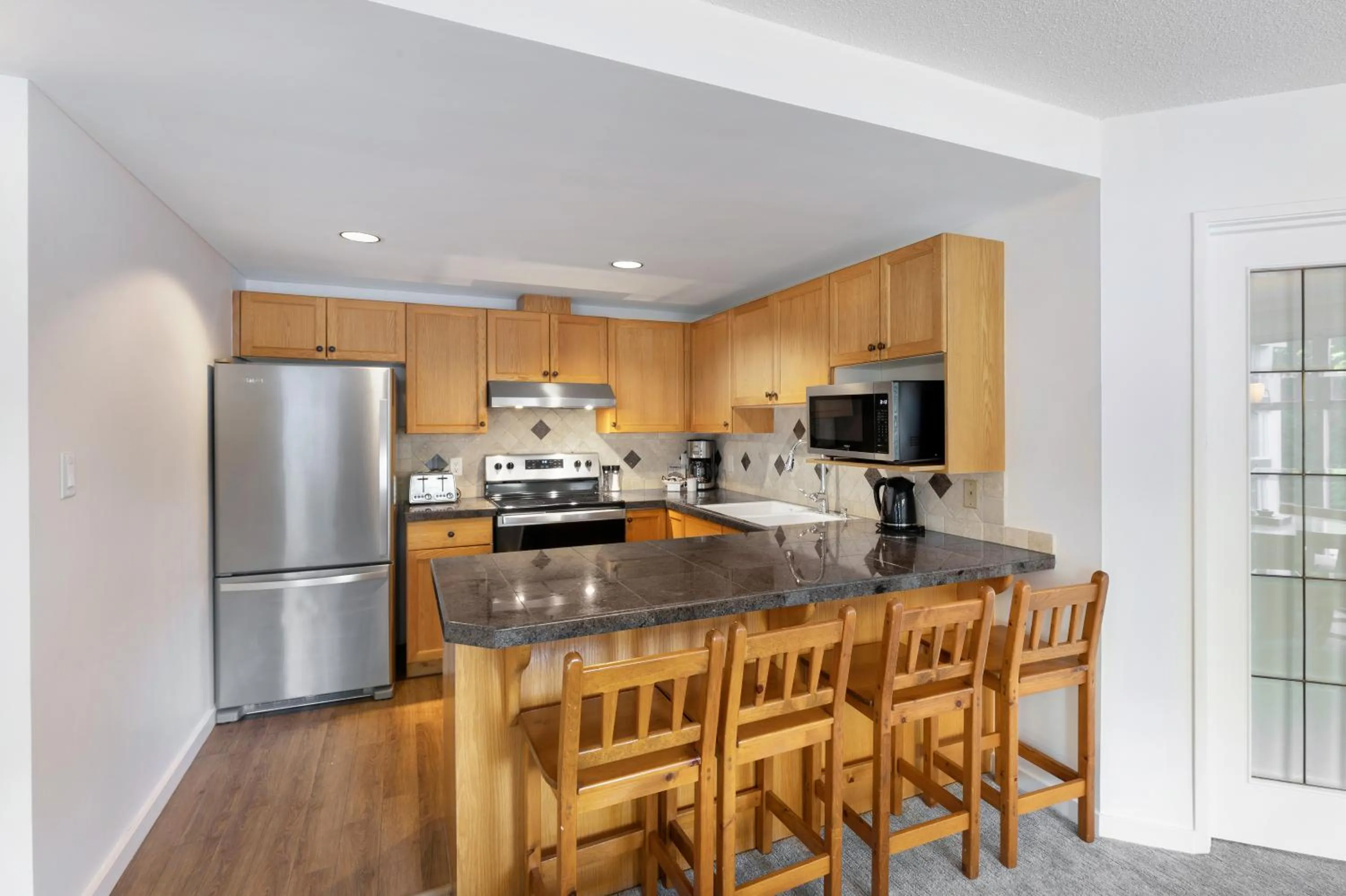 Kitchen or kitchenette in The Woodrun Lodge by Whiski Jack