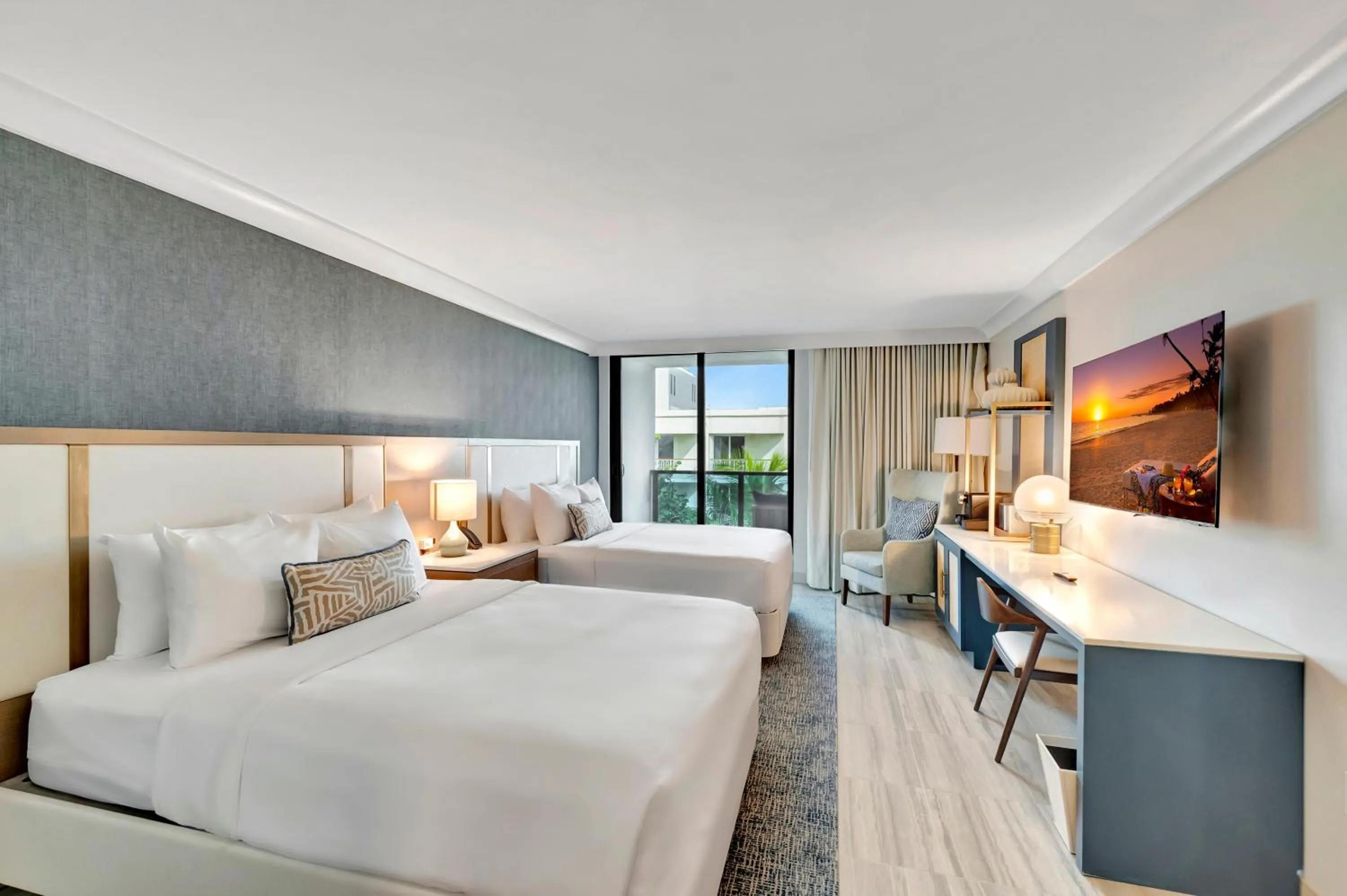 Bed in Tideline Palm Beach Ocean Resort and Spa