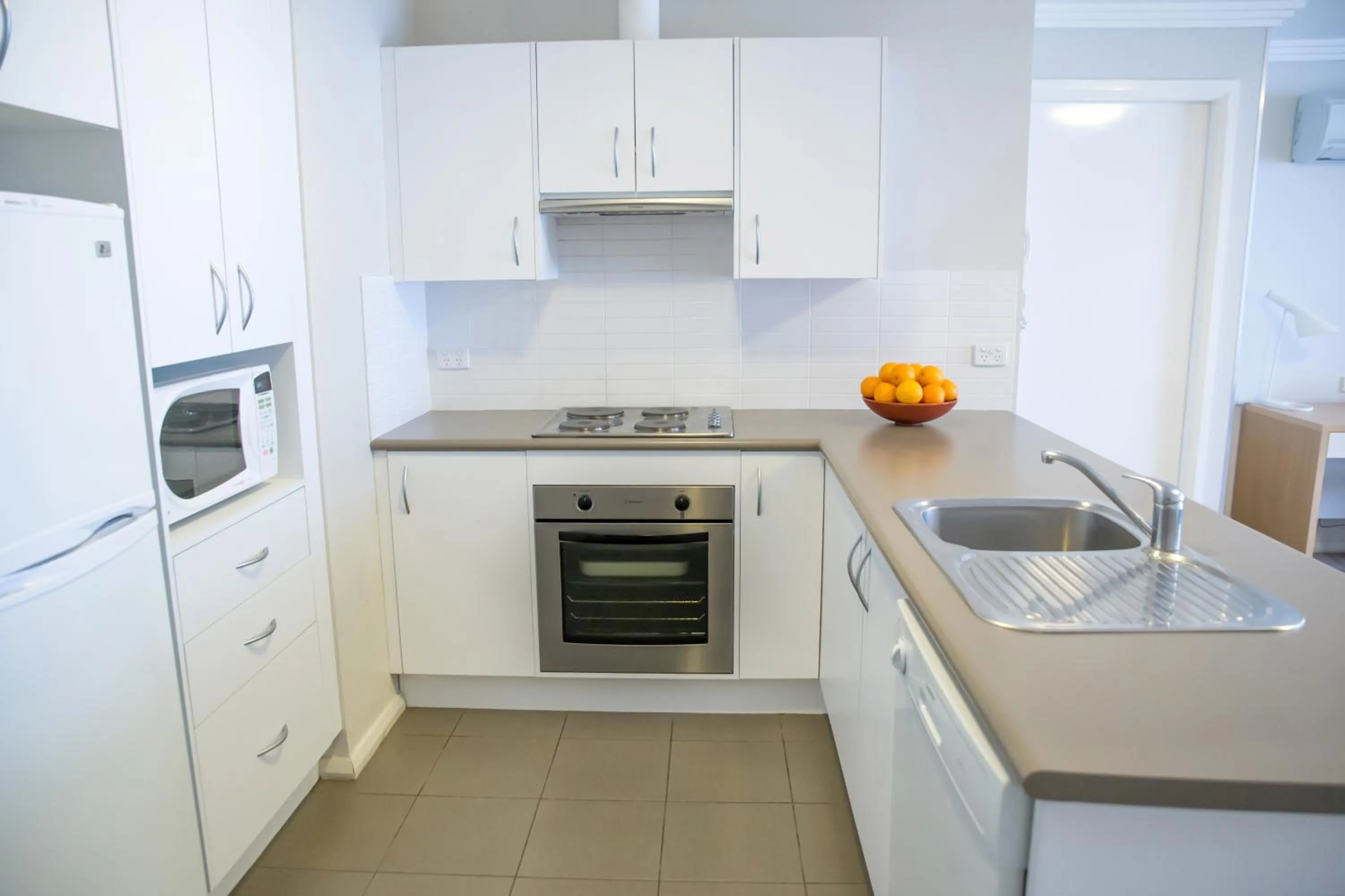 Kitchen or kitchenette in Quest Wollongong