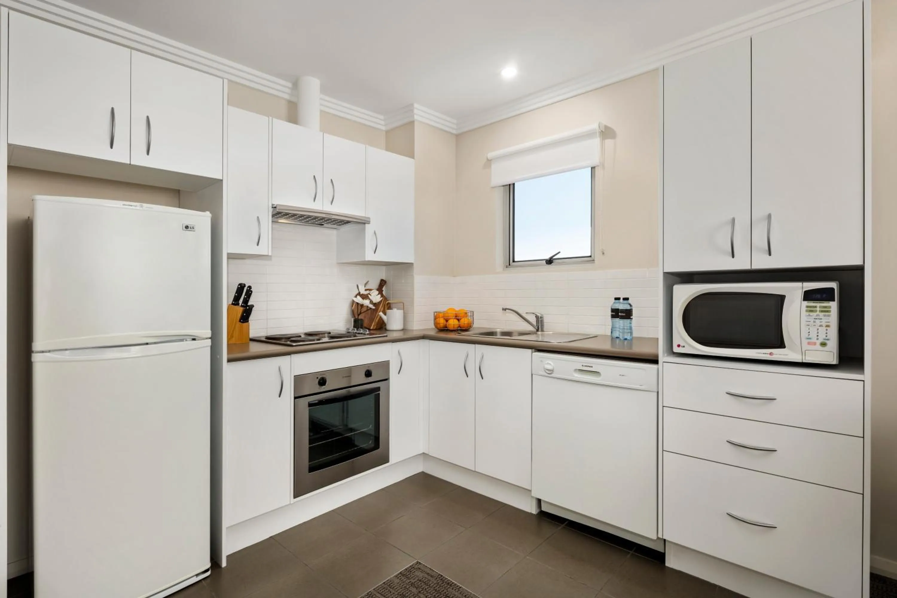 Kitchen or kitchenette in Quest Wollongong