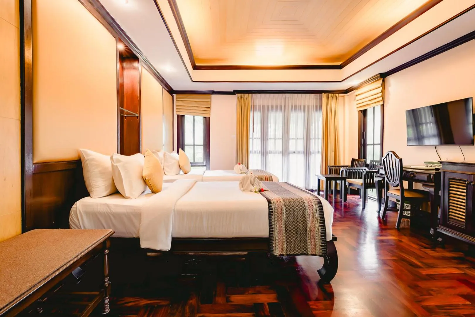 Bed in Khaolak Palm Beach Resort