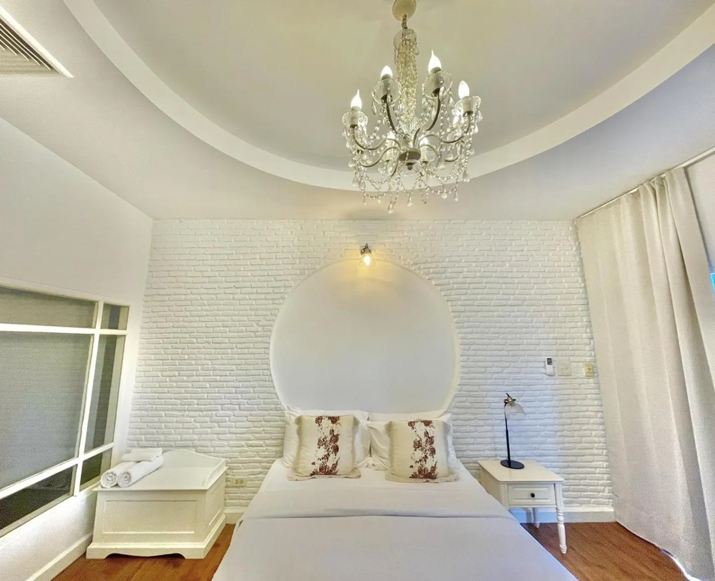 Bed in Green Gallery Beach Boutique Hotel