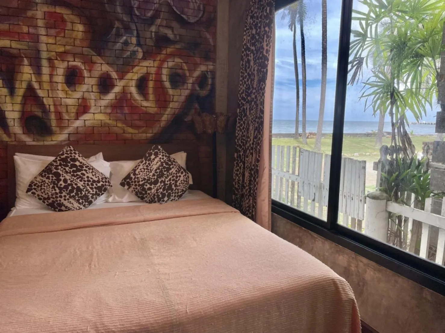 Bed in Green Gallery Beach Boutique Hotel