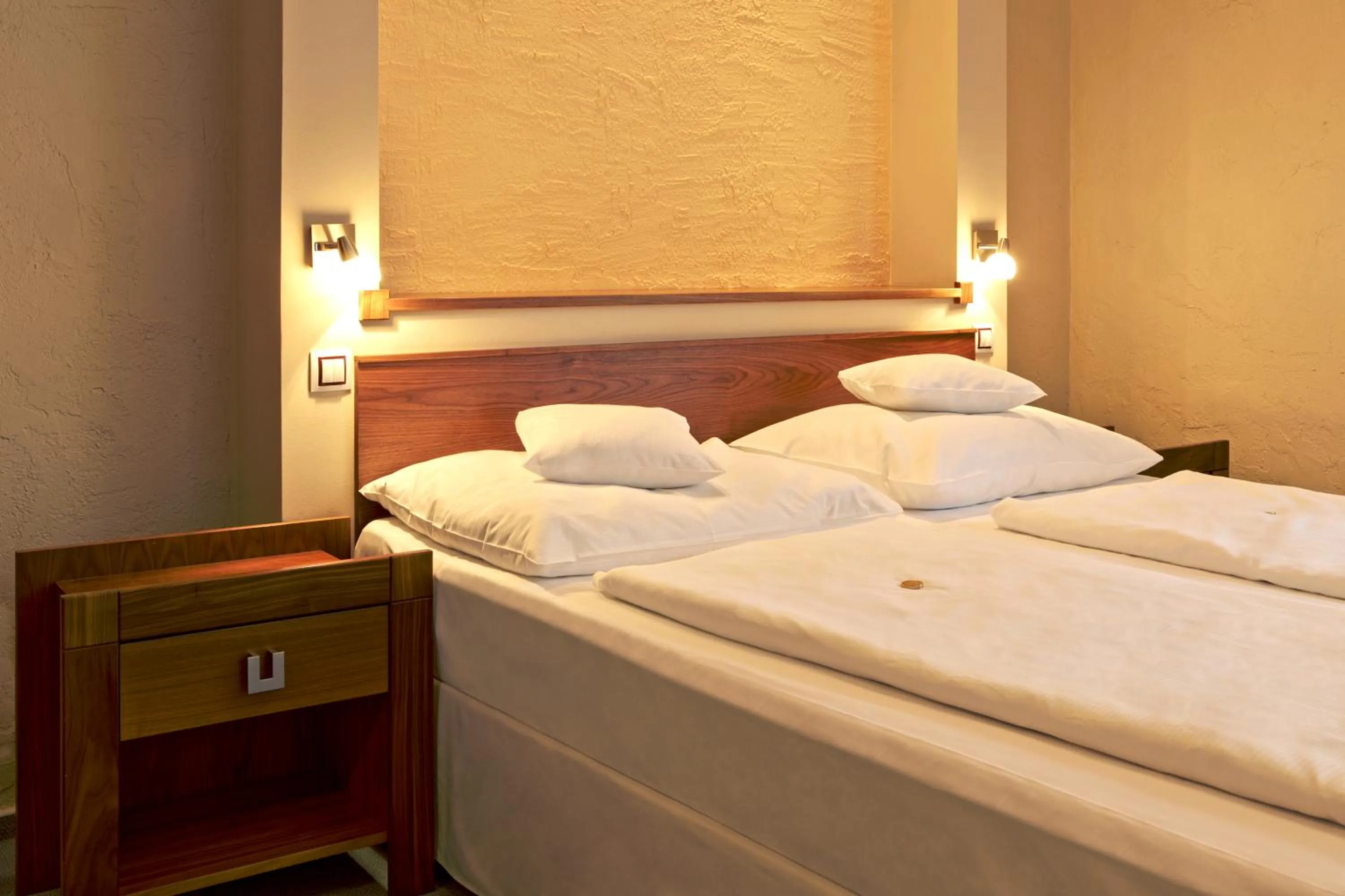 Bed in Spa & Wellness Hotel St. Moritz
