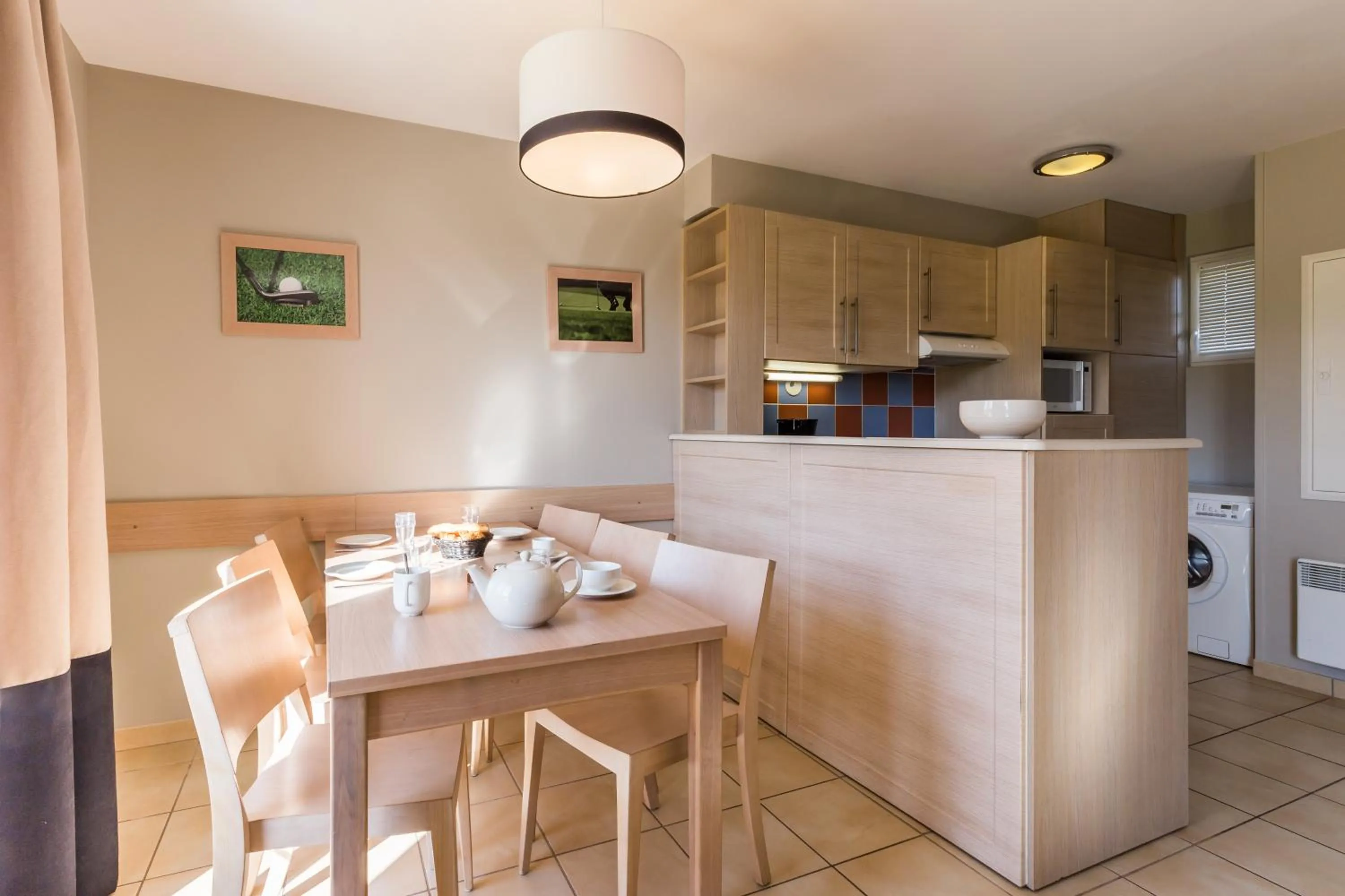 Kitchen or kitchenette in Résidence Pierre & Vacances le Green Beach