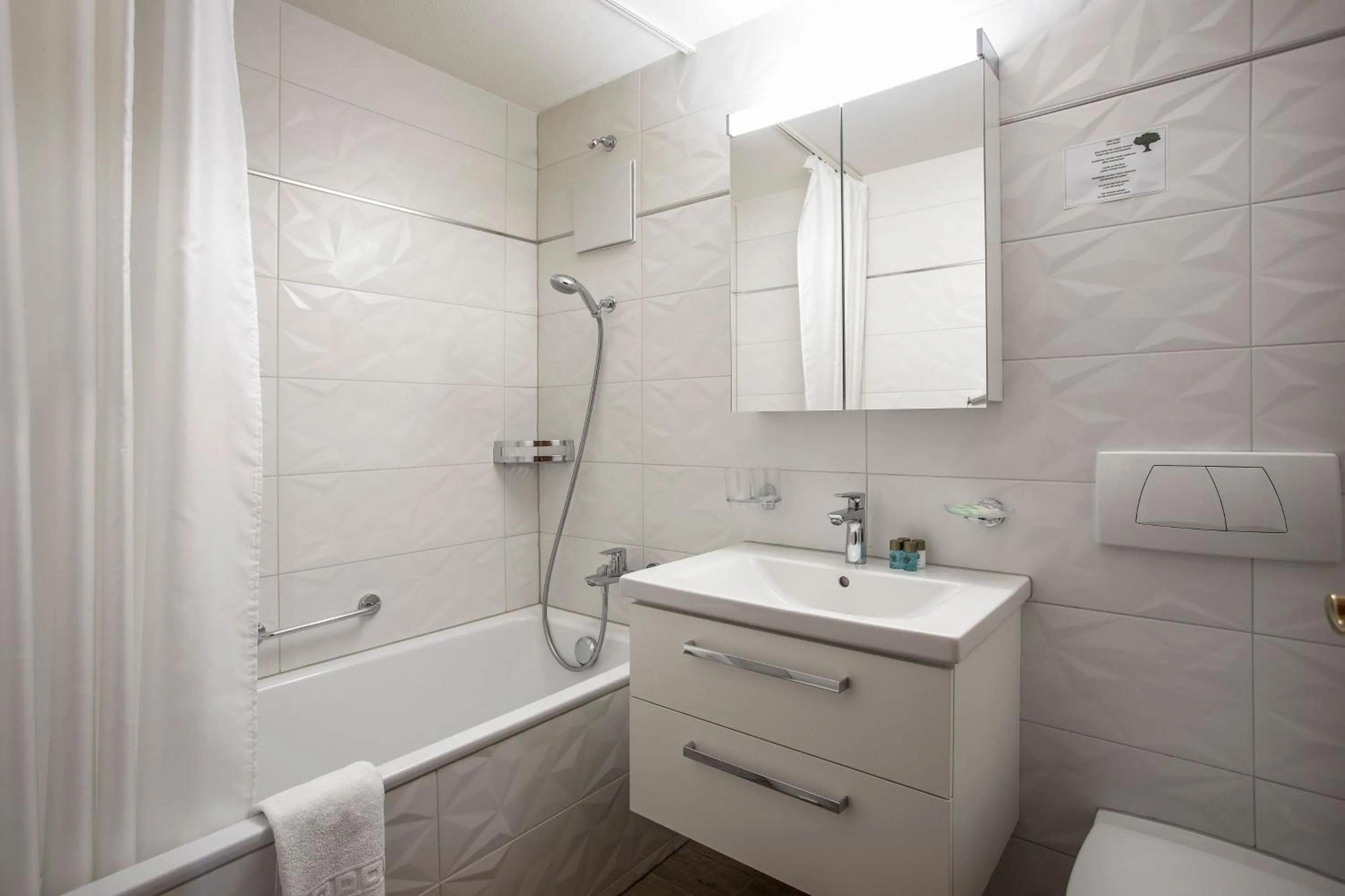 Bathroom in Aparthotel Ambassador