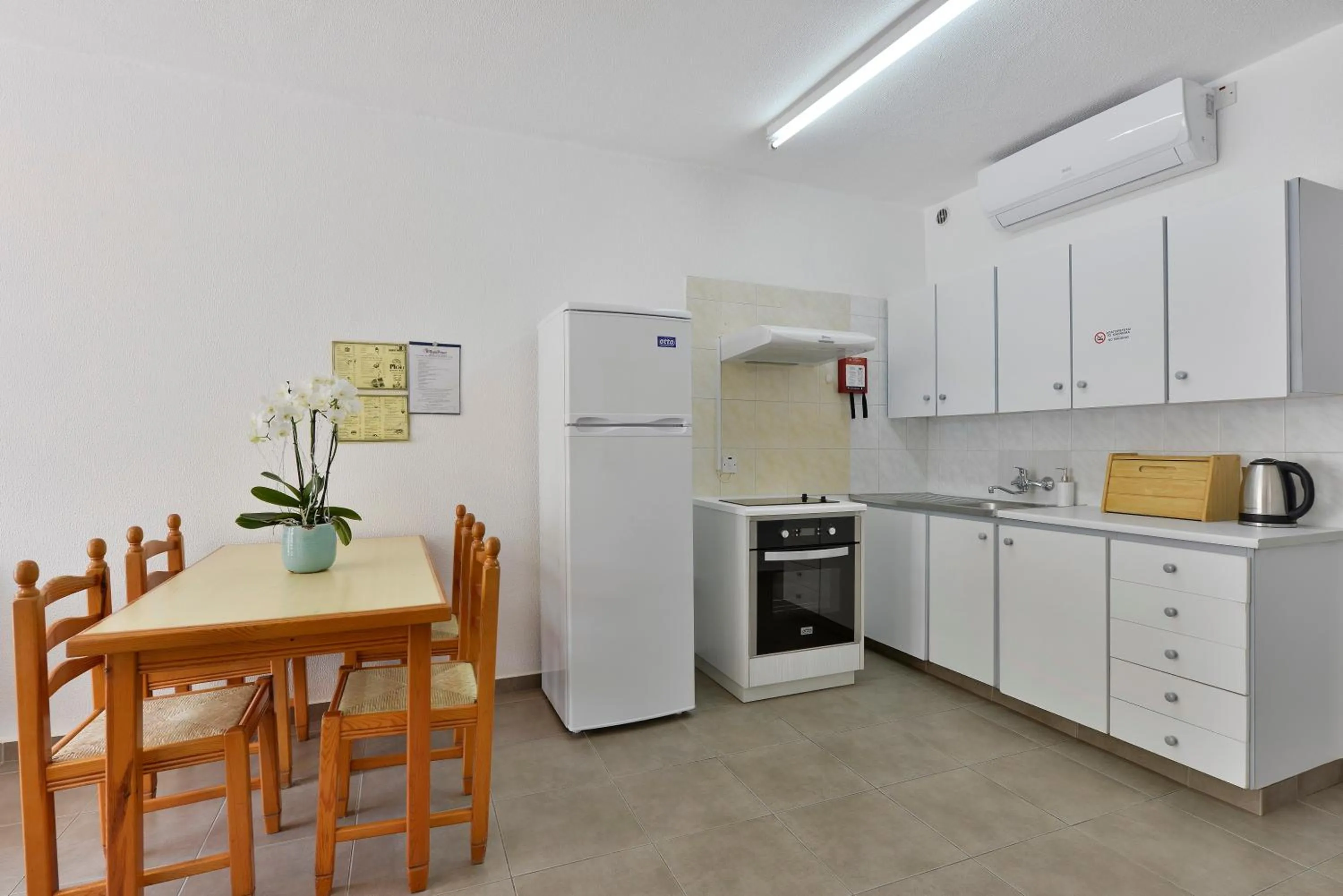 Kitchen or kitchenette in Napa Prince Hotel Apts