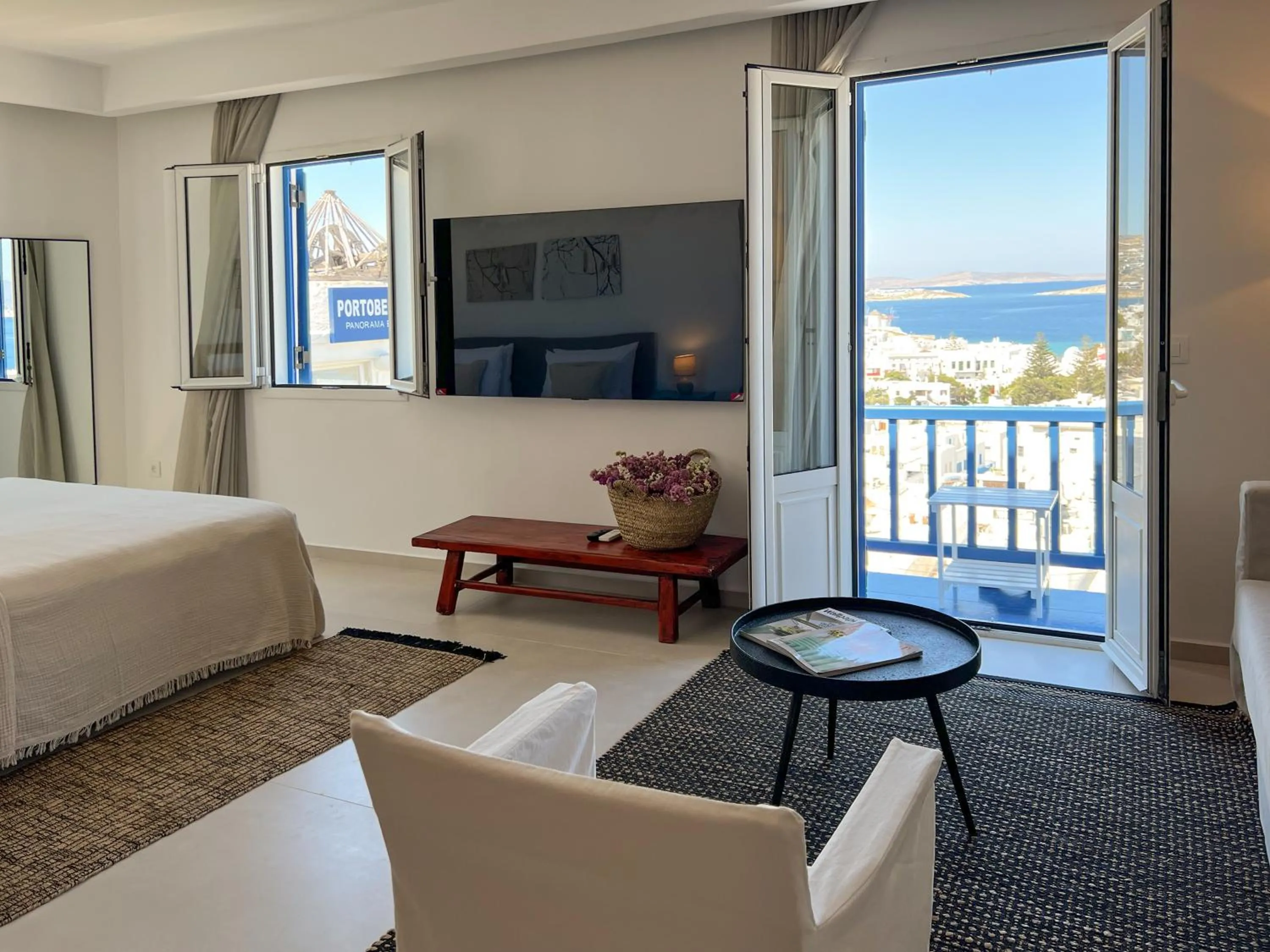 Seating area, Bed in Portobello Boutique Hotel