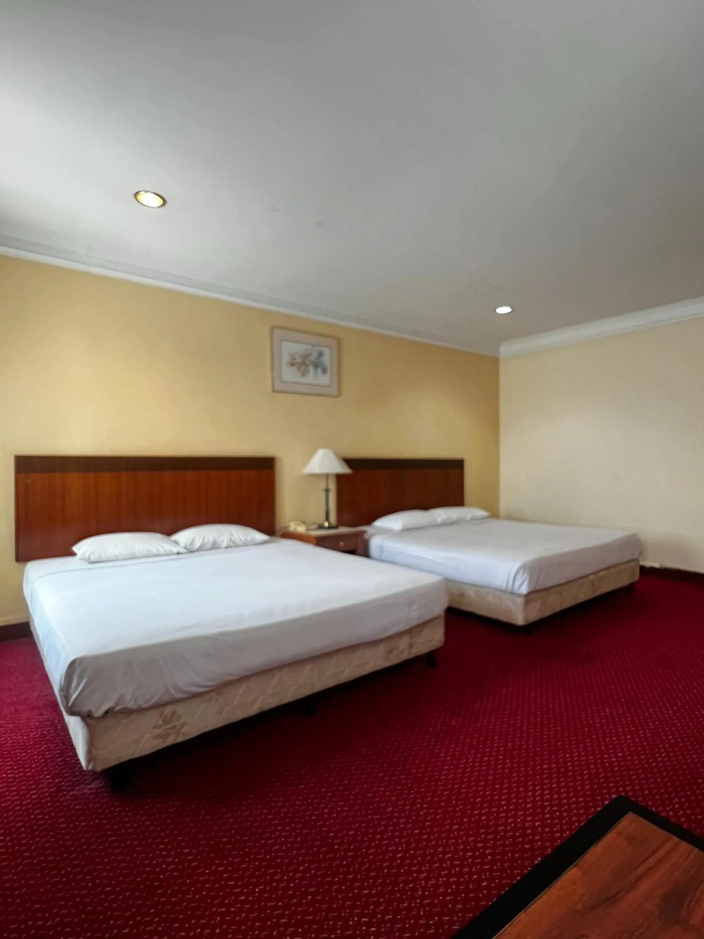 Bed in Grand Pacific Hotel PWTC