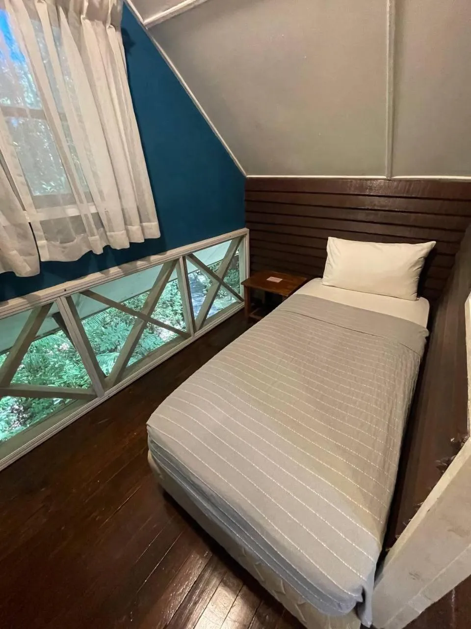 Bed in Permai Rainforest Resort