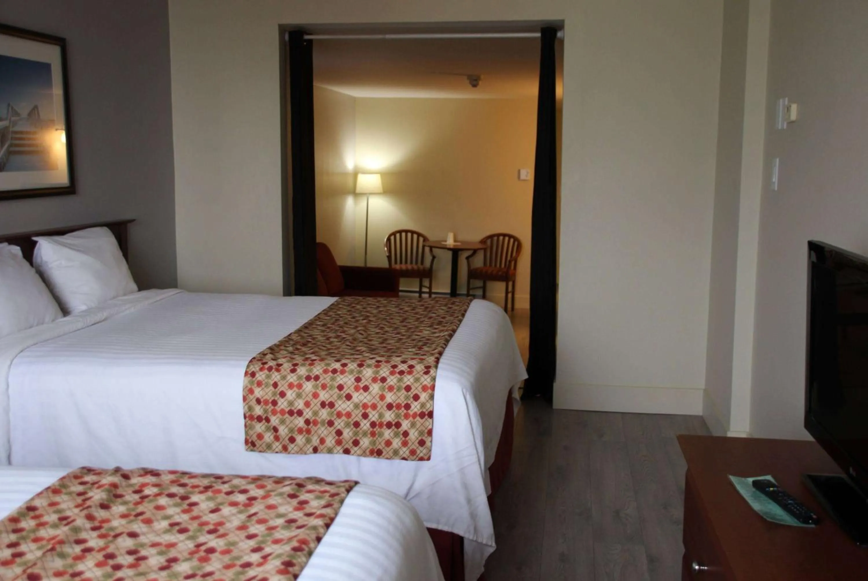 Photo of the whole room, Bed in Super 8 by Wyndham Campbellton NB