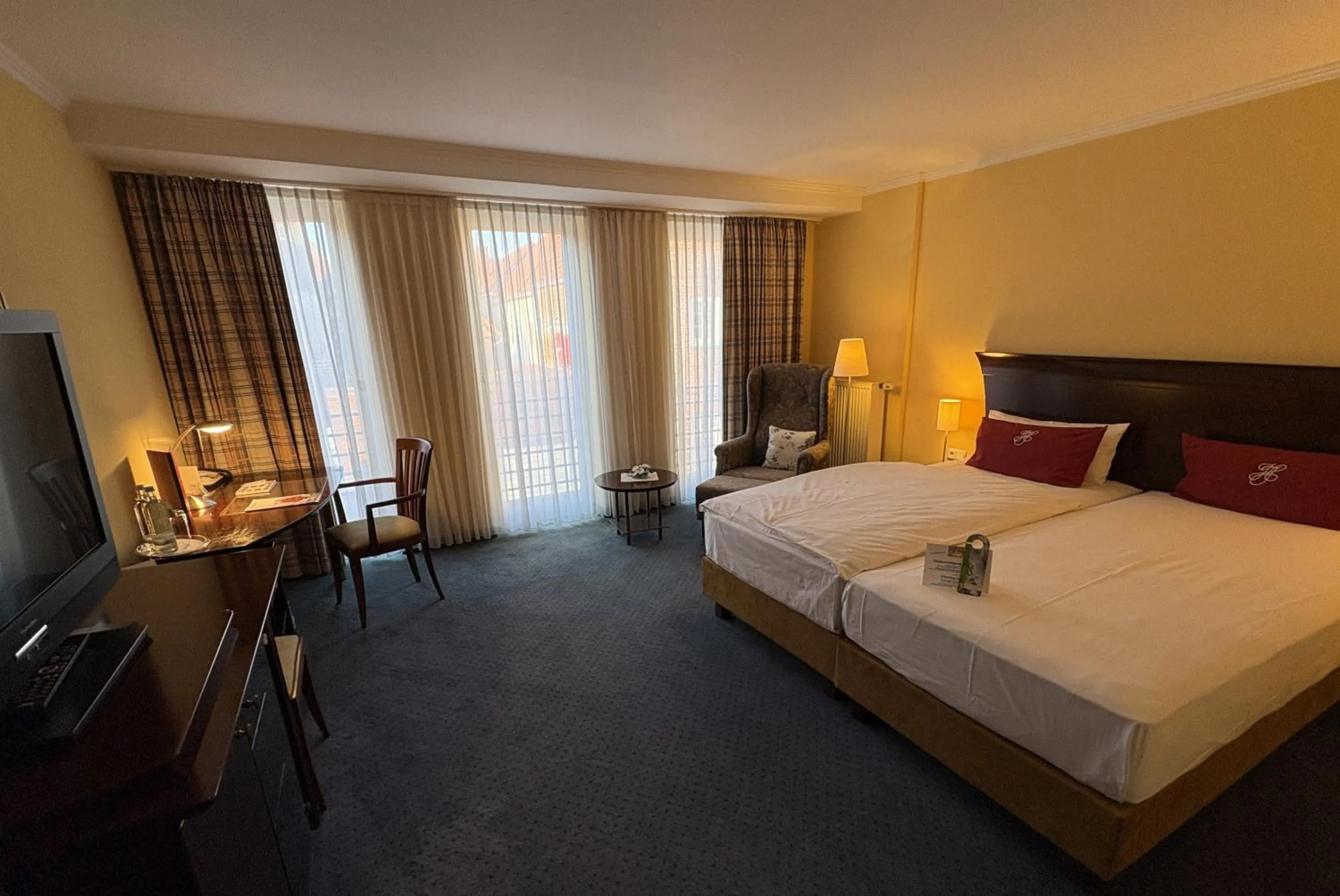 Photo of the whole room, Bed in Akzent Hotel Höltje